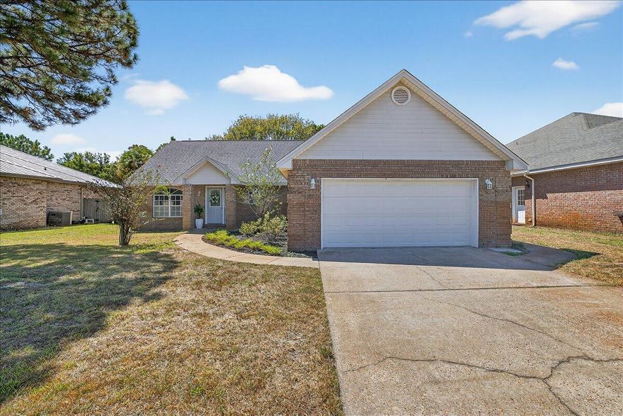Great Location and No HOA's!! Brick Home with Split Floor Plan, 3 Bedrooms, 2 Baths, Fireplace, and nice back deck for cookouts or just relaxing with friends! Fenced in Backyard if you have pets! New Roof, New Hot Water Heater, Fresh Paint, Open Floor Plan. New Refrigerator and some minor upgrades (Flooring, Guest Bathroom, Mirrors, Ceiling Fans,  Lighting and Landscaping). Looks great a must see to appreciate!   Vacant Easy Show!