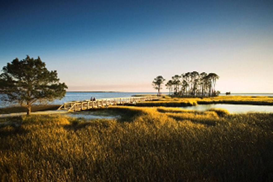 This is a prime lot that overlooks the tidal marsh located in RiverCamps, an exclusive St. Joe waterfront community, just 10 minutes from the beach and housing fewer than 450 homes! RiverCamps on Crooked Creek is a 1,500 acre pine forest gated community surrounded by three spectacular bodies of water, Crooked Creek, West and the Intracoastal Waterway. The amenities in this community include a 25,000 sq.ft. RiverHouse, the community activity center, encompassing of decks, boardwalks, covered pavilions, and a 600 foot pier that extends into West Bay. The RiverHouse also includes a pool, hot tub, fitness center, library, catering kitchen, dining area and our homeowners can reserve kayaks, canoes and bikes.