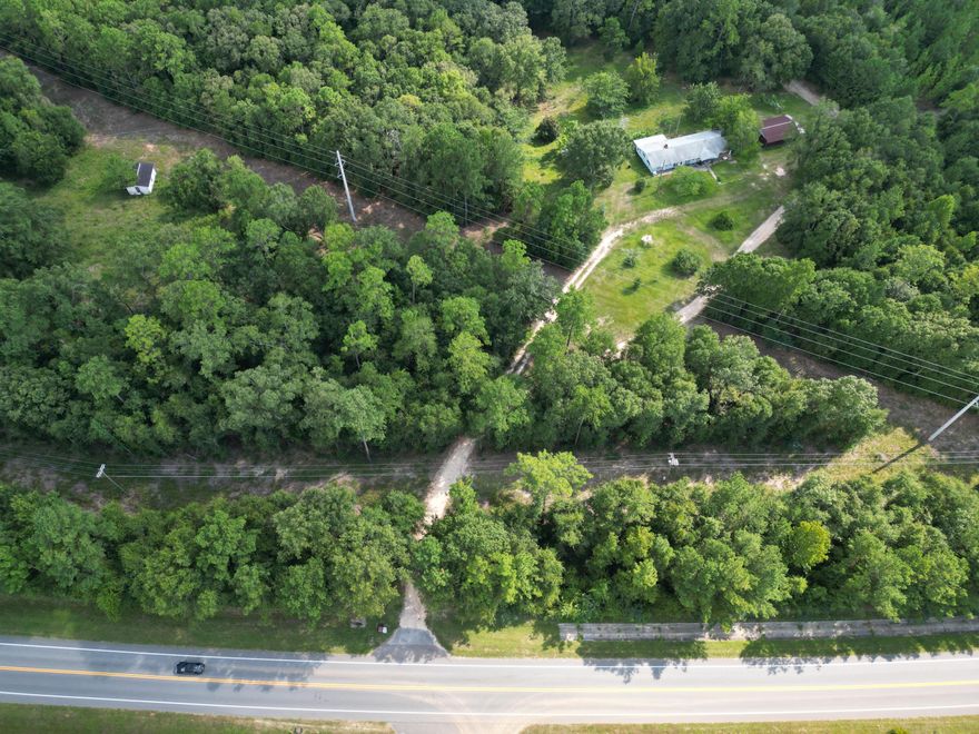 Welcome to your future 4 acre country home site! Property is partially cleared and wooded. Power and water are available. Property is about 5 mins from a public boat ramp on Escambia River. Enjoy fishing, horseback riding, camping, and all the fun outdoor activities just a short distance from your home. Paved road frontage on Hwy 4. Close proximity to schools, grocery stores, shopping, and eateries. Zoned AG-RR 1 dwelling per Acre can be divided into 3 parcels with a shared driveway. PER THE COUNTY : can get 4 parcels if they are split into 1 acre lot