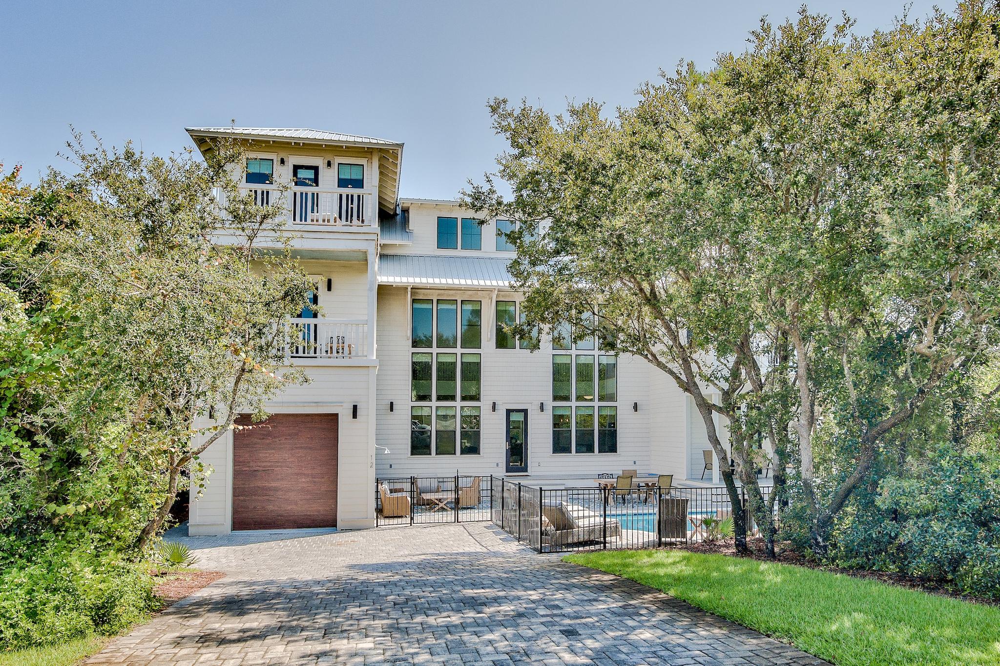 With it's ideal location in close proximity to the beach, this gorgeous home would be perfect as a primary residence or vacation rental. Featuring an outstanding, three-story wall of windows, this home will welcome you in with fantastic Gulf views. Enjoy the five bedrooms; including a master bedroom with private access to the pool, six bathrooms, a second-floor master suite with a private balcony, a private pool, and a large garage. The main living space features a large living room and a chef's kitchen- making it perfect for entertaining. Additionally; the home is fully automated, providing for a seamless and convenient ownership experience. Experience life how it should be experienced on 30a, and in this gorgeous home.