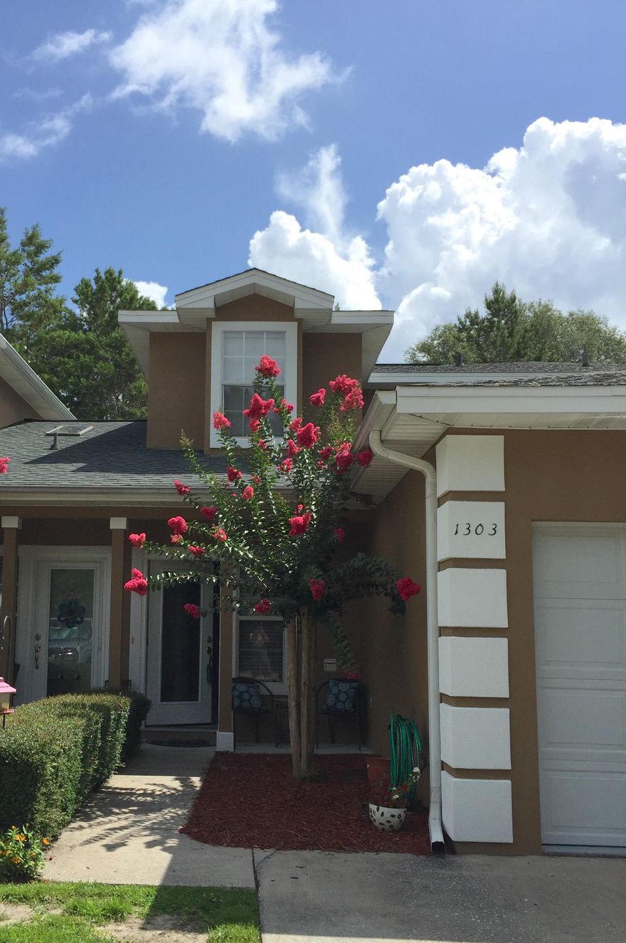 Stunning three bedroom townhome in premier complex, Reflections at Bluewater Bay, located near end of private cul-de-sac. Imagine quiet evenings in the screened porch overlooking the natural preserve. Relax in your sleek, contemporary abode with wood and tile floors and an accommodating floor plan where you can use the master bedroom downstairs - or up. All the closets are walk-ins! The kitchen has granite counters, center isle and pantry, with tile floors. Flow into the living room and the master bedroom with double doors. The baths have high vanities, the master bath has a soaking tub. A/C new in 2012 with 10 year warranty. Exterior siding recently painted. Great location in the complex with guest parking across street. The Destin beach is 12 minutes away, Eglin AFB an easy commute!