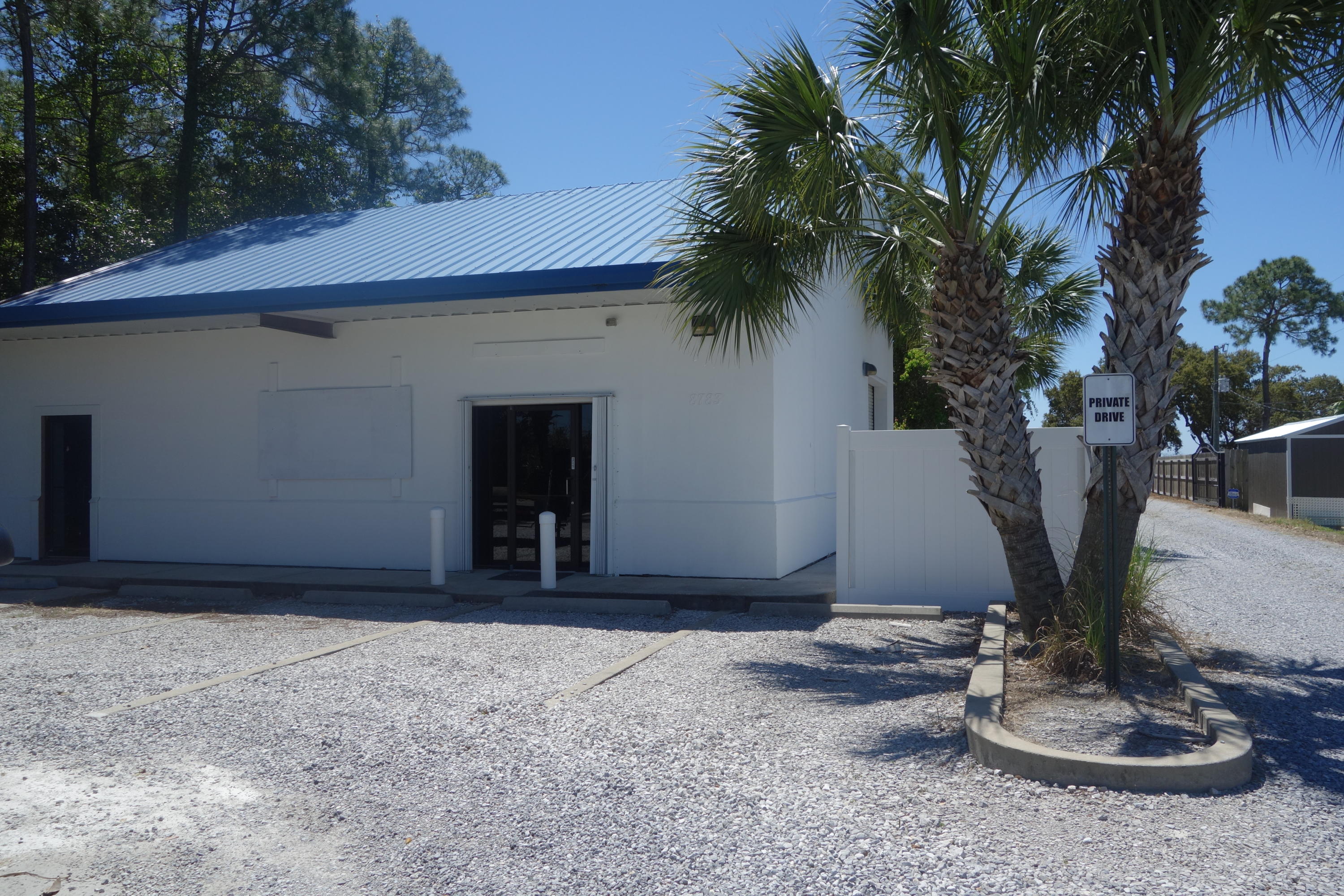 Commercial building on Navarre Parkway with 1840 SF on ground floor and 920 SF of storage on second floor level. Property is located on the south (water) side of Hwy 98 about 1/2 mile east of Navarre Beach bridge. Building has bath and 10' roll up garage door for rear storage. Close proximity to Navarre Beach with ideal visibility from busy Hwy 98. Buyer to confirm all dimensions and square footage.