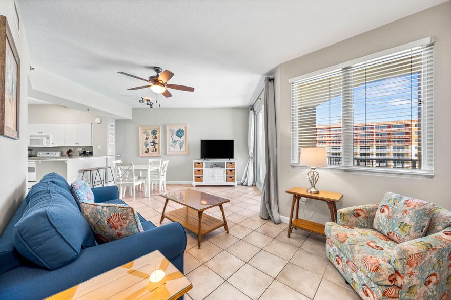 Discover your perfect beach getaway in this charming 2-bedroom, 1.5-bathroom condo with bonus bunk area. Wake up to breathtaking gulf views and enjoy direct beach access. The spacious open-concept living area is filled with natural light, leading to a private balcony overlooking the sparkling Gulf of Mexico. The kitchen features ample counter space and a breakfast bar. The master suite includes a private bath and generous closet space. Ideal for families or rentals, this condo offers a fantastic coastal lifestyle with nearby dining, shopping, and entertainment. Shores of Panama offers many resort style amenities! A colossal lagoon pool, private beach access, tiki bars, hot tub, indoor heated pool, fitness center, sauna, steam room, and a spa! Don't miss this opportunity! Updates include: repainted the entire condo. Replaced furniture just last year and most of the lights and fans. Replaced curtains. New Patio Furniture.  New artwork.