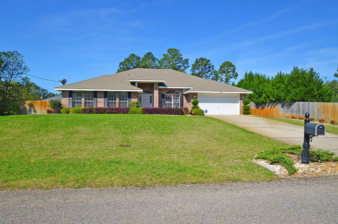 Located in desireable Holly By The Sea, this home is a spacious 3,000 sq.ft. 4 bedroom 3 bath on a half acre corner lot. The home features new carpet, paint, and a wood burning fireplace in the corner of the great room. The great room has a cathedral ceiling and plant ledges. The kitchen and breakfast room is large a has a center island. Just off the kitchen is a large walk in pantry and laundry room.The home sits up high on the lot.Room dimensions are approximate.
