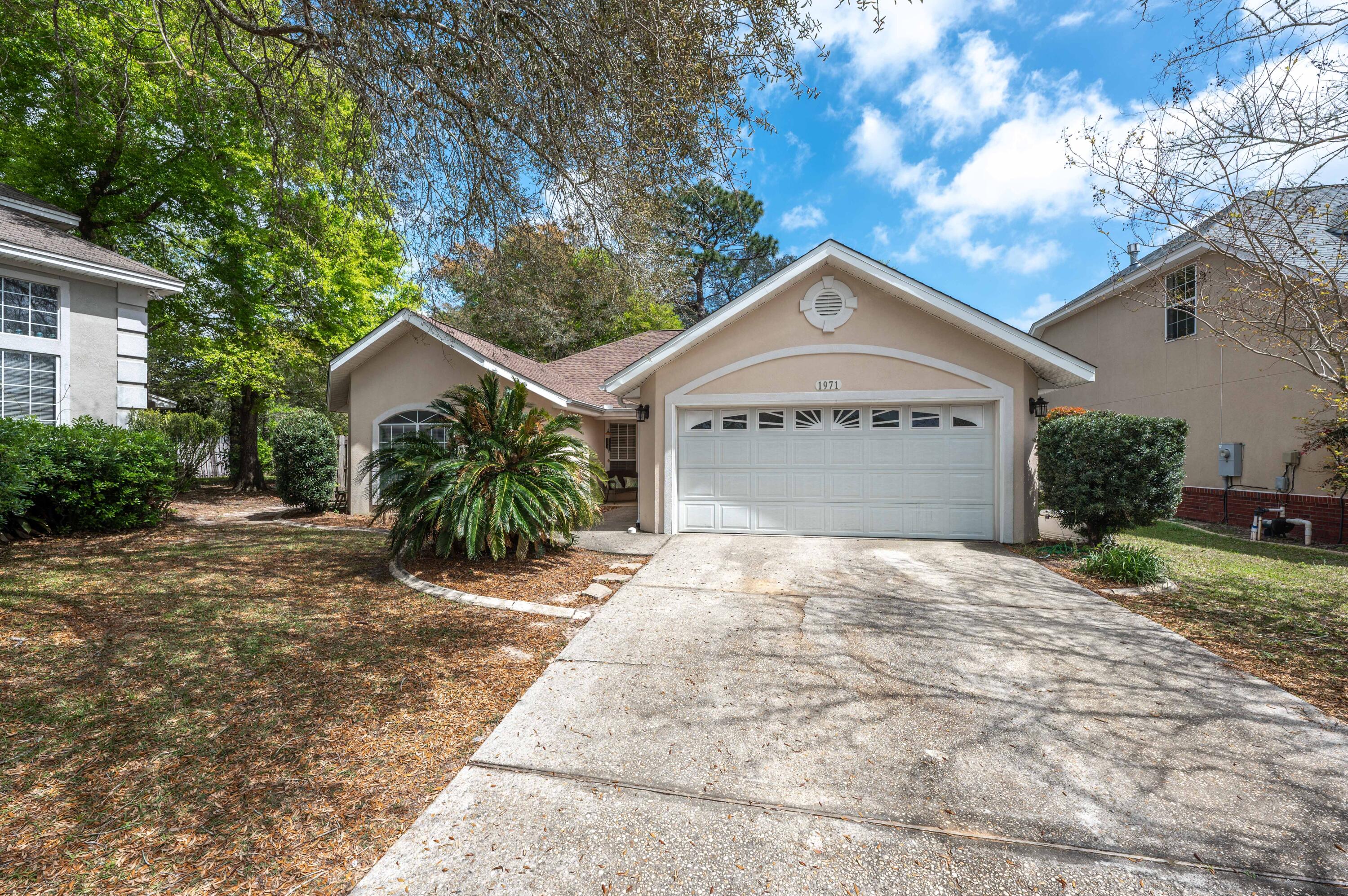 Experience the ultimate in modern living with this updated 3-bedroom, 2-bathroom home near Eglin AFB! With stunning LVP flooring throughout the living room and hallways, and sleek tile in the kitchen and bathrooms, this home exudes style and comfort. The kitchen is equipped with brand new stainless steel appliances from 2020, making it perfect for hosting guests. Take a break from the chilly winter weather and cozy up by the warm gas fireplace. Plus, enjoy peace of mind knowing the roof was replaced in 10/2020, and the water heater was updated in 2010. The AC and heat system were also replaced in 2021, making this home turnkey ready for you to move in and make it your own. The living room features a stunning brick accent wall, adding a touch of charm to the space. Shed is negotiable.