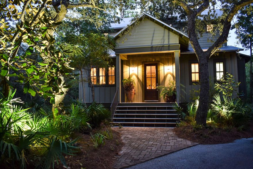 Welcome to 200 Adair Lane, Santa Rosa Beach, FL--a distinguished residence offering an exceptional blend of luxury and tranquility. This 3-bedroom, 2.5-bathroom home, designed by the renowned Chandra Hartman and constructed by Southern Cottages, exemplifies top-quality craftsmanship and meticulous attention to detail.Nestled amidst majestic oaks adorned with Spanish moss, this property is situated on a serene, naturally wooded lane at the end of a cul-de-sac. A small creek behind the home provides a picturesque setting for paddle sports and outdoor enjoyment.Spanning 2,124 square feet, the interior of this home features an array of custom details. Custom built cabinets complemented by granite countertops