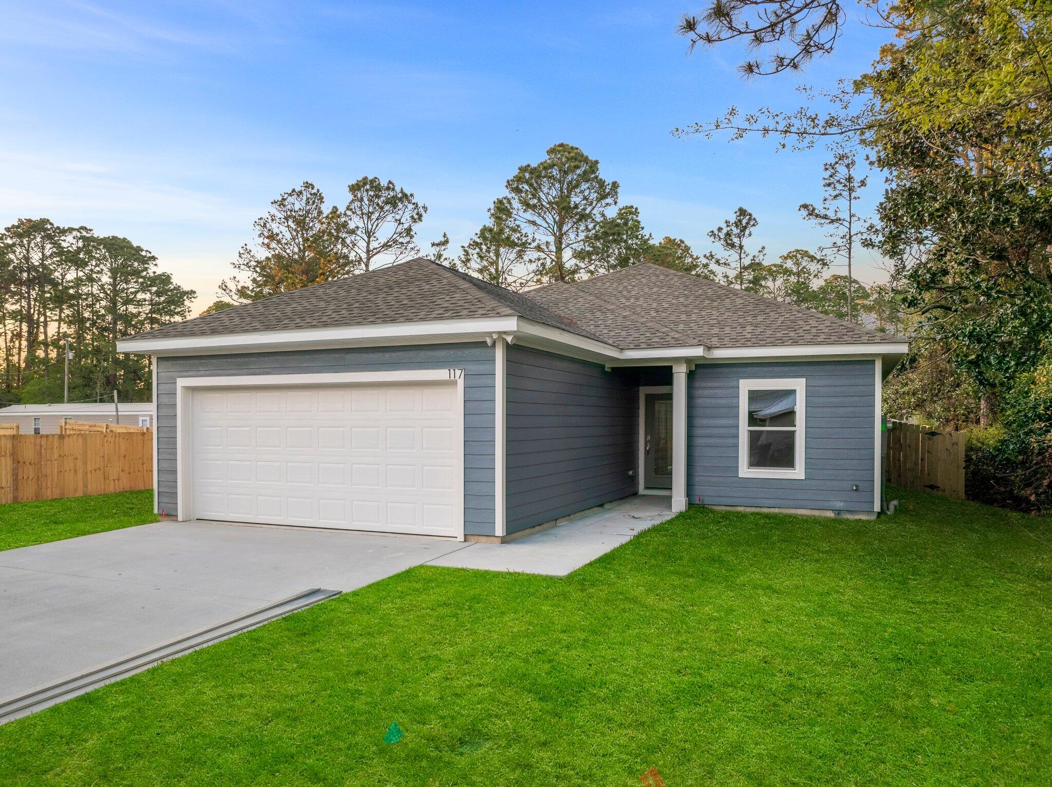 NEW CONSTRUCTION and MOVE-IN ready!! Welcome to your dream home in one of the fastest growing communities in the Niceville area!! This stunning single-family home is a testament to excellence and quality craftsmanship. Situated in Villa Tasso, this home offers a combination of elegance, comfort, and functionality. Don't miss your opportunity to own this AFFORDABLE masterpiece that exceeds expectations.The open floorplan showcases a large living area that opens to the wonderful kitchen w/ adjacent dining room (or home office). The kitchen features Quartz countertops, Legacy cabinets & brand new Whirlpool appliances adding modern convenience & stylish functionality. Retreat to your oversized primary bedroom suite with luxurious attached bathroom and large walk-in shower. The