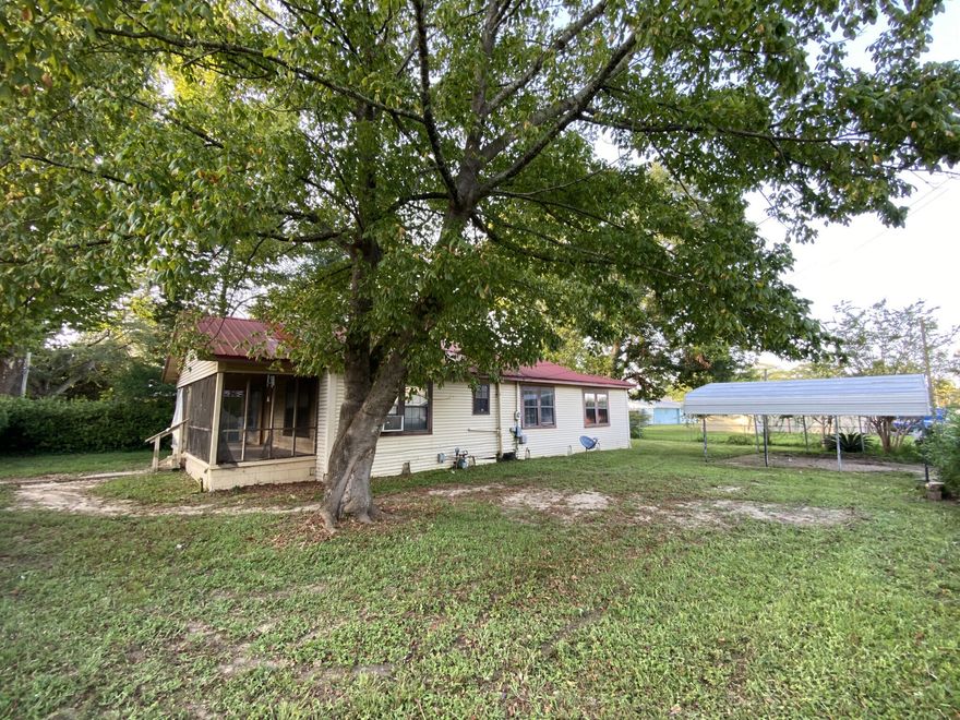 Corner lot! Fixer with loads of potential.