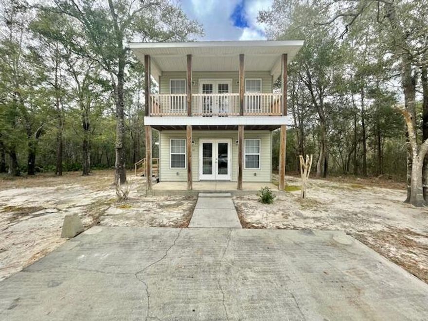 Available March 8! Pets Considered with Owner Approval! **First available showing February 1**Welcome to 140 Hickory Loop Drive in Freeport, FL! This charming house offers a fantastic open floorplan with spacious living space, perfect for entertaining. The kitchen is a true highlight, featuring beautiful white cabinets, granite countertops, and stainless steel appliances. On the first floor, you'll find elegant tile flooring! The bedrooms are conveniently located on the second floor, providing a peaceful retreat. The second floor also boasts luxurious LVP flooring, adding warmth and style to the space. The bathrooms are equally impressive, with white cabinets and granite countertops that create a sleek and modern look. Additionally, the primary bedroom offers a deck,