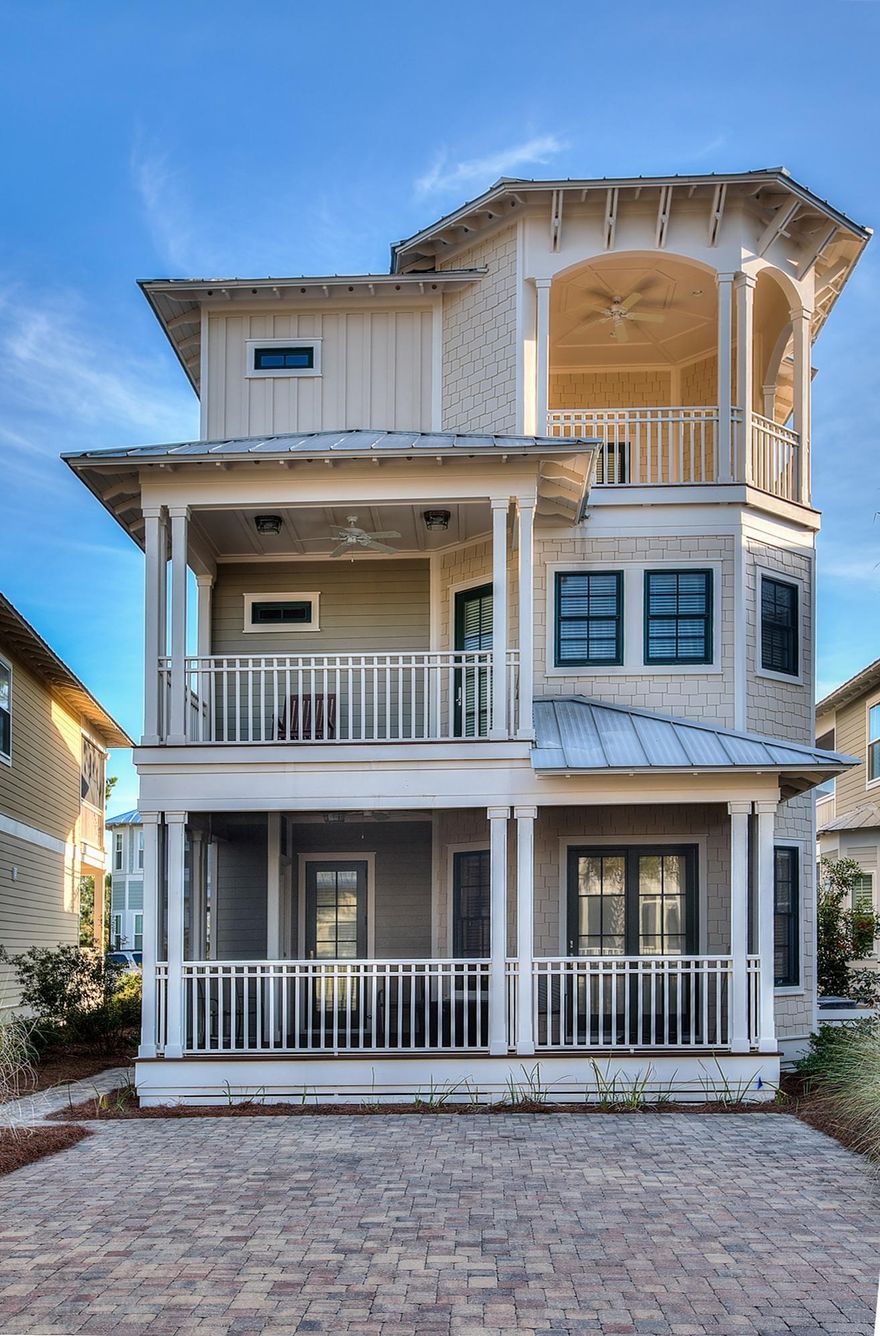 This is the lowest price per sq/ft price on any home in the community! This home also has great rental potential for any investor. There is no home like this in the community- this 4BR/4.5BA, 2,906 sq Ft home is sure to wow. It's located in a finished part of the community far away from any of the new construction. Landscaping is more mature and looks beautiful from atop one of the 5 covered porches! Attention to detail is everywhere in the home from the v-groove trim on the 1st floor and cottage style crown moulding to the ceiling detail on every porch! Home also features pine floors, tile in all baths, 10 ft ceilings throughout, outdoor shower and wide staircases The kitchen comes complete with GE stainless steel appliances including gase top cooktop, granite countertops, backsplash, ect.  Plus things you won't find in new construction- 2 Rinnai tankless hot water heaters, 3 Carrier AC units, 5 covered porches and high quality Anderson doors and windows! ''The Gathering Place,'' the community's amenity center includes: a resort-style beach entry pool, heated lap pool, children's pool, tot lot, hammocks, multiple entertainment areas including a fire-pit and grills (and seasonal beach shuttle) - all encompassed by the beauty of Point Washington State Park. 