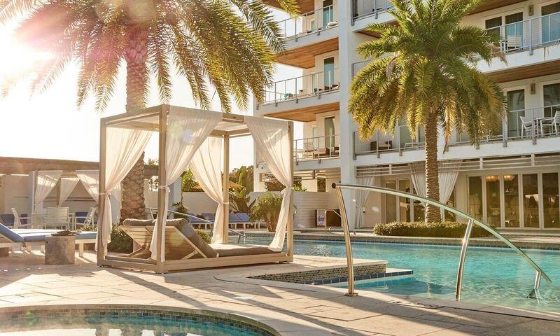 Welcome to Unit 335 at The Pointe on 30A! Discover coastal living at its finest perfectly situated by Rosemary Beach. With rental projections at $65K annually, Unit 335 can be a lucrative investment property as well as a rejuvenating escape for your family. Located on the luxurious eastern end of 30A, this charming residence offers unparalleled walkability to boutique shops, gourmet dining, and pristine beaches. Enjoy a bright, open-concept living space with large sliding glass doors showcasing pool-side views. The kitchen features stainless steel appliances with a gas range and quartz countertops. This beautifully appointed 2-bedroom, 2-bathroom unit also features high-end built-in bunk beds ideal for peak performance as a vacation rental. The expansive pool-side deck is ideal for savoring morning coffee or sunset cocktails while soaking in the gulf breezes. The Pointe on 30A features a resort-style pool with cabanas and hot tub as well as a rooftop terrace with Gulf views. The development offers a modern fitness center and on-site restaurant. Embrace the 30A lifestyle in this rare gem, where luxury, location and walkability converge.