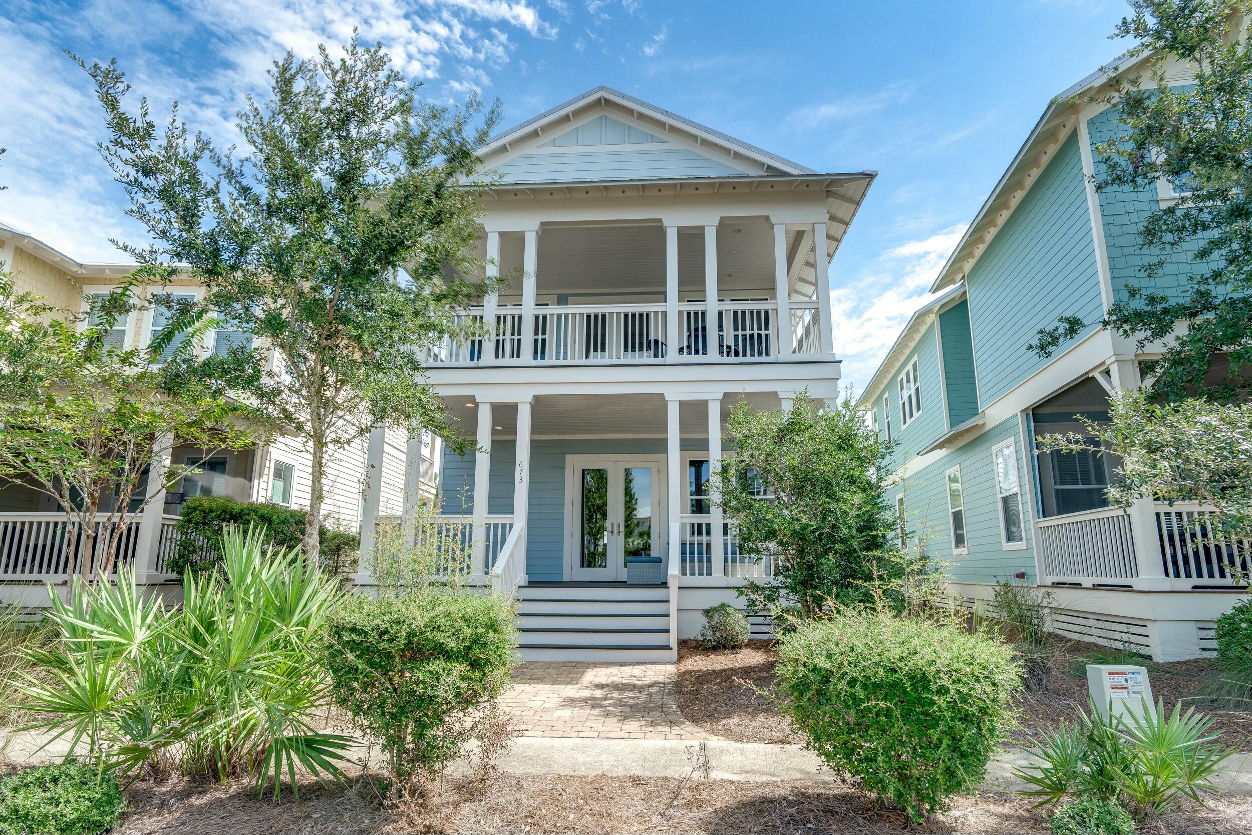 BACK ON THE MARKET AND PRICED TO SELL! Welcome to 673 Flatwoods Forest Loop in the charming Santa Rosa Beach, Florida! This immaculate home offers a blend of style and functionality, making it the perfect coastal retreat. As you step inside, you'll be greeted by the warm and inviting atmosphere created by the solid pine floors that run throughout the living spaces. The recently touched up paint, both inside and out, adds a fresh, modern feel to this already stunning home. The floor plan of this home is designed for relaxation and enjoyment, featuring three covered porches. Two of these porches are located off the front of the house, providing the perfect spots to unwind and soak in the coastal ambiance. Additionally, one of the porches is conveniently situated off the loft area, making it easily usable by anyone in the household. With three spacious bedrooms, plus an adorable bunk room and loft area, this home offers ample space for family and guests. The downstairs includes a junior suite, providing privacy and comfort for guests seeking their own retreat within the home.
NatureWalk at Seagrove, is a central 30A gem, just a bike ride away from the iconic town of Seaside. Plus, a nearby trail to the beach gets you there in just 5 minutes by bike.
NatureWalk at Seagrove is not just a home; it's a lifestyle. It's an amenity-rich community with trails that wind through the natural beauty of the area. The Gathering Place is the heart of the community and offers a beach entry pool, hot tub, kiddie pool, and a heated lap pool. For those looking to stay active, the neighborhood also boasts pickleball and multi-purpose courts, as well as outdoor fitness stations.
Whether you're seeking a peaceful retreat or a savvy investment with rental projections of up to $80k, 673 Flatwoods Forest Loop in NatureWalk at Seagrove presents a rare opportunity to own a piece of paradise in one of Florida's most sought-after coastal communities. Don't miss your chance to make this stunning property your own and experience the coastal lifestyle at its finest.