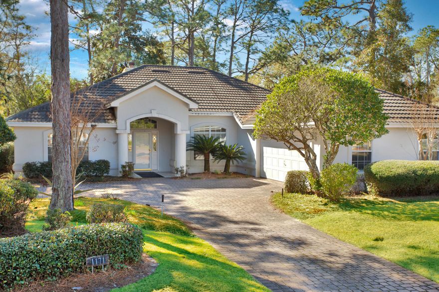 Fabulous location for this three-bedroom Troon home that just oozes potential.  Bring your architect or most creative self to make this home your own - open concept floor plan, vaulted ceilings, gas fireplace, large master bedroom with sitting area.  All one level including two additional bedrooms and bath in this split floor plan.  This resort home is located in a quaint neighborhood with mature trees, blooming flowers, and a serene backyard setting - and within a block of the Raven Golf Club. Don't miss this rare opportunity to find a home in this prestigious neighborhood of Sandestin and make it your dream home.  Being sold AS-IS.