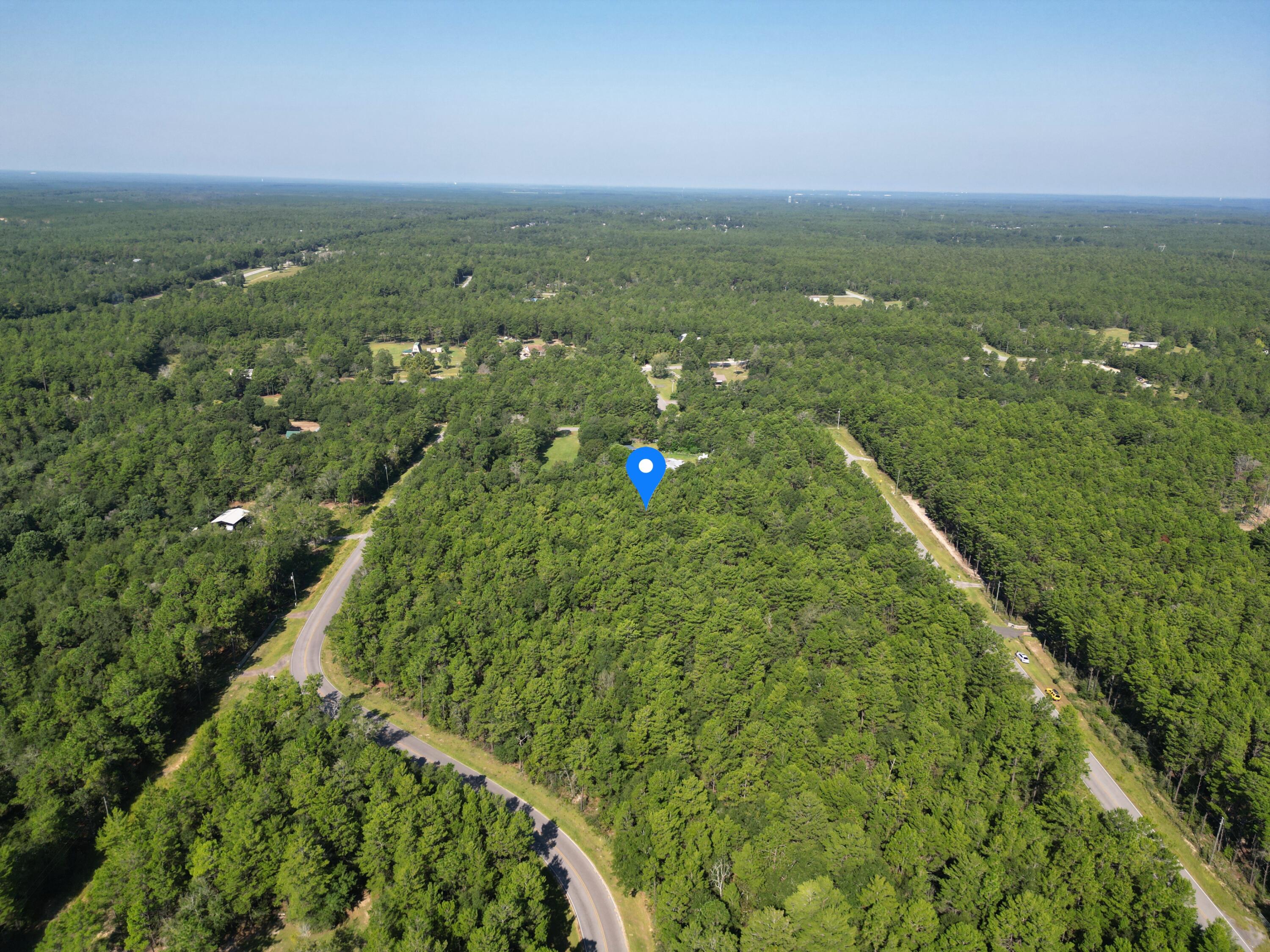 Welcome to ''Goat Hill Haven'' - 4.4 acres of beautifully wooded, buildable land. Just a short drive to historic Lake DeFuniak. You'll experience a vibrant blend of small-town charm, culture, and nature. Create a long, private driveway as it gently curves through the trees, opening up to a beautifully wooded homesite with plenty of space to build your dream retreat. Dotted with just a few neighboring homes, you'll enjoy the serenity of rural living without feeling completely off the grid.Community Events:LakeFest: A beloved annual festival held at Lake Defuniak features fish fries, paddleboard races, cardboard boat challenges, inflatable duck races, a car show, live entertainment, food vendors, and kids' activities.
