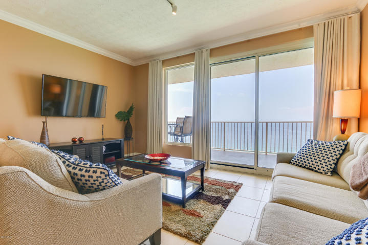 If you are looking for a one of a kind property and a terrific investment look no further! This highly sought After, 2 Bed/2 Bath condo on the 22ND floor of Treasure Island and has one of the BEST VIEWS on Panama City Beach! Enjoy sunrise views in the morning and Sunset views in the evening! The layout of this over-sized condo's interior is superb for entertaining, offering 10' ceilings through-out and an excess of space and features!! Very well maintained. Will convey fully furnished, turnkey, and rental ready! The pet friendly complex has a large heated pool and a kiddy pool and two gazebos, covered parking, four high-speed elevators, fitness room, owner's lounge and game room. It is located on Thomas Drive within walking distance of Saint Andrews State Park and minutes from the area's