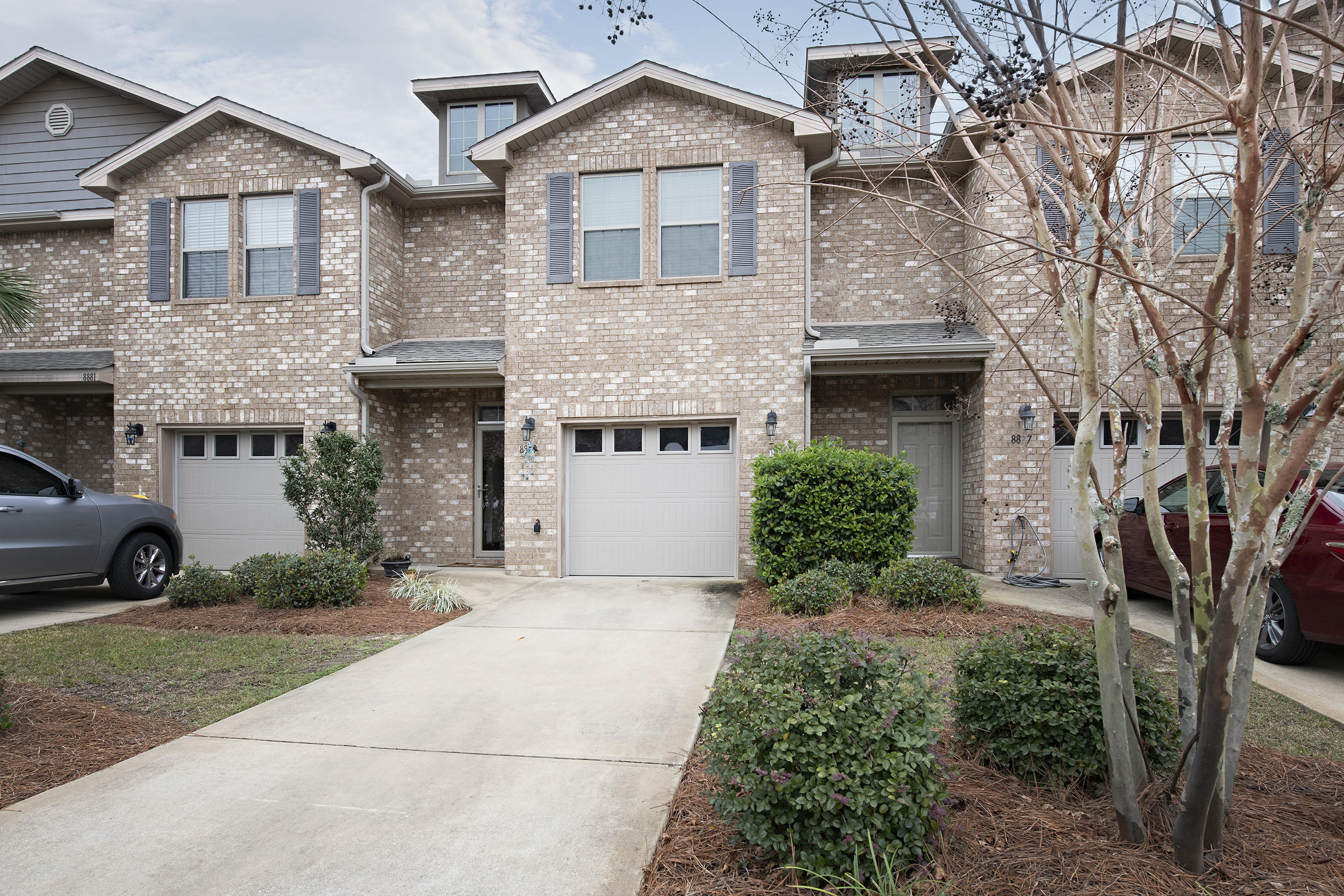 Welcome to this well kept townhome in Reserve Point. Easy commute to Hurlburt and Navarre Beach. Spacious 3 bdrm, 2.5 ba, 1554 sf 1 car garage. 1st floor provides an open and well appointed kitchen w/ granite counters, 42' cabinets and a tile backsplash along with 20'' tiles, covering the entire 1st floor. Upgraded to beautiful engineered hardwood on the stairwell throughout the main hallway of the second floor. Master has a walkin closet, double vanities and separate shower. Each bathroom has granite counters, tile & custom cabinets. Gutters cover the front entry & a storm door protecting the front and back door. No yard work or exterior maintenance. Owners are willing to sell all furniture along with the property. The complex has a very beautiful pool area plus a playground