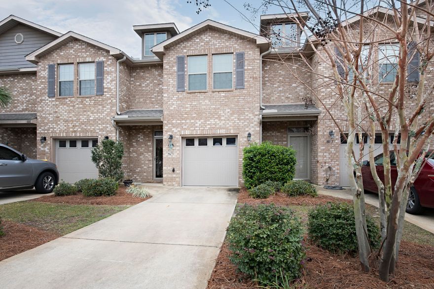 Welcome to this well kept townhome in Reserve Point. Easy commute to Hurlburt and Navarre Beach. Spacious 3 bdrm, 2.5 ba, 1554 sf 1 car garage. 1st floor provides an open and well appointed kitchen w/ granite counters, 42' cabinets and a tile backsplash along with 20'' tiles, covering the entire 1st floor. Upgraded to beautiful engineered hardwood on the stairwell throughout the main hallway of the second floor. Master has a walkin closet, double vanities and separate shower. Each bathroom has granite counters, tile & custom cabinets. Gutters cover the front entry & a storm door protecting the front and back door. No yard work or exterior maintenance. Owners are willing to sell all furniture along with the property. The complex has a very beautiful pool area plus a playground