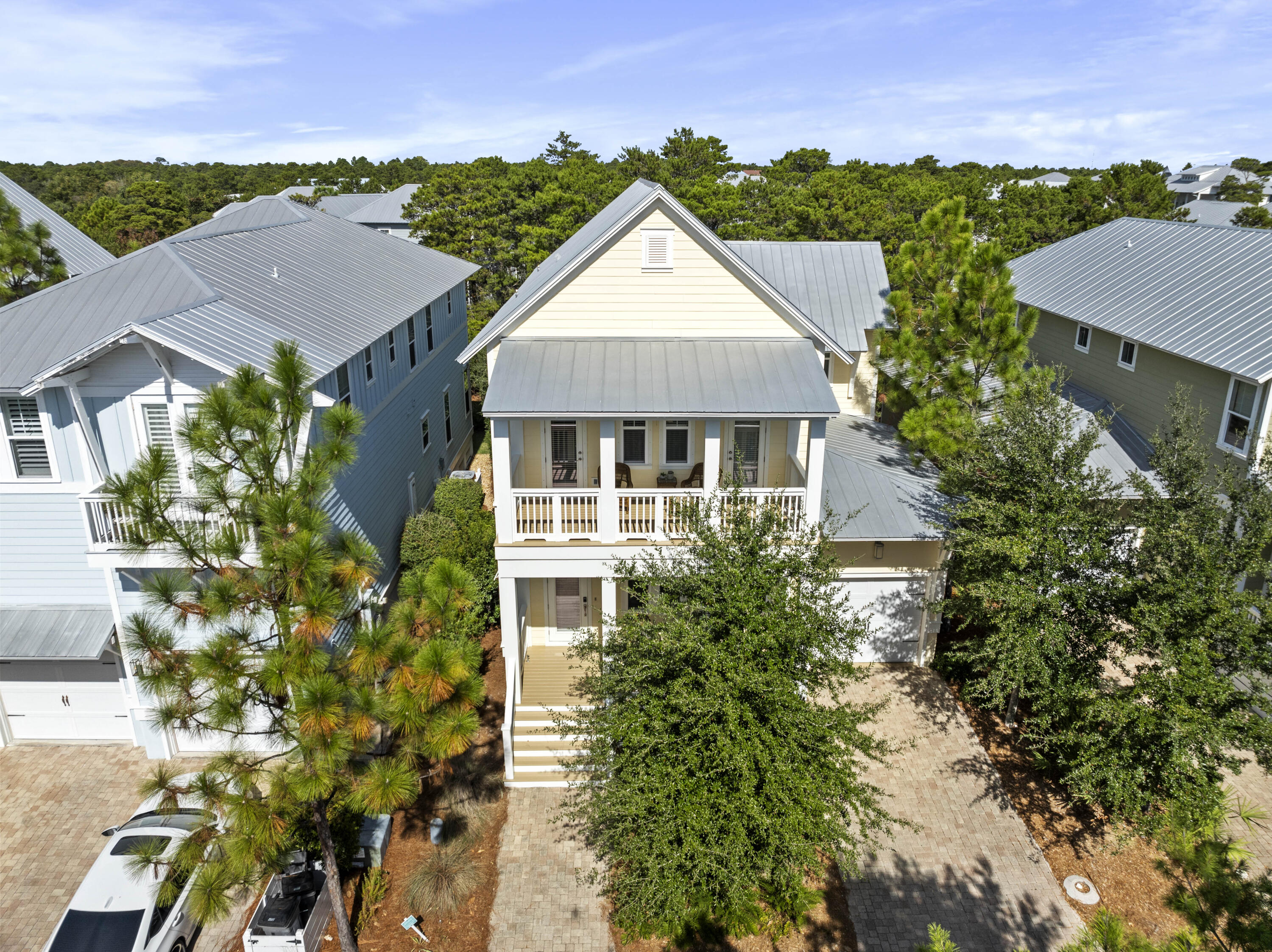 Discover coastal luxury and modern charm at this stunning 4-bedroom, 4.5-bathroom home in the coveted Highland Parks neighborhood of Blue Mountain Beach. Just steps from 30A, this spacious retreat boasts an oversized, open-concept living and kitchen area, perfect for entertaining. The chef's kitchen shines with a large island, updated finishes, and ample natural light, creating a welcoming hub for family and friends. The primary suite is conveniently located on the first floor, offering privacy and convenience, while each bedroom provides access to one of the home's multiple porches and balconies, ideal for soaking in the beach breeze. Highland Parks enhances your lifestyle with an impressive community pool, BBQ area, lush green spaces, and a scenic sunset lookout tower.

With nearby access to boutique shopping, local restaurants, and the Gulf's sandy shores, this home is the ultimate blend of comfort, elegance, and location. Don't miss your chance to make this dream property your home.