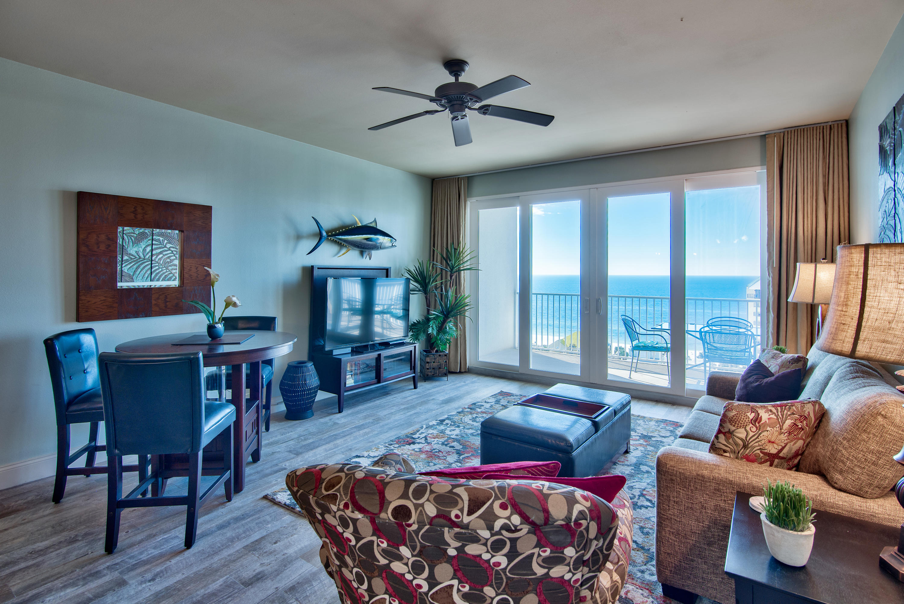Enjoy The Beautiful Gulf View From This Updated, Fully Furnished Condo At Laketown Wharf. This 2 Bedroom, 2 Bathroom Condo Features Wood Look Tile Flooring Throughout, Granite Countertops, Ceiling Fans In The Living Room And Bedrooms, And Stacked Washer/Dryer. Walk Across The Street For Some Fun On The Beach During The Day, And Then Enjoy The Fountain And Light Show On The Lake At Night. Laketown Wharf Has Something For The Whole Family Including 5 Pools, A Fitness Room,Bar & Grill, Restaurants, A Candy/Ice Cream Shop, And More!