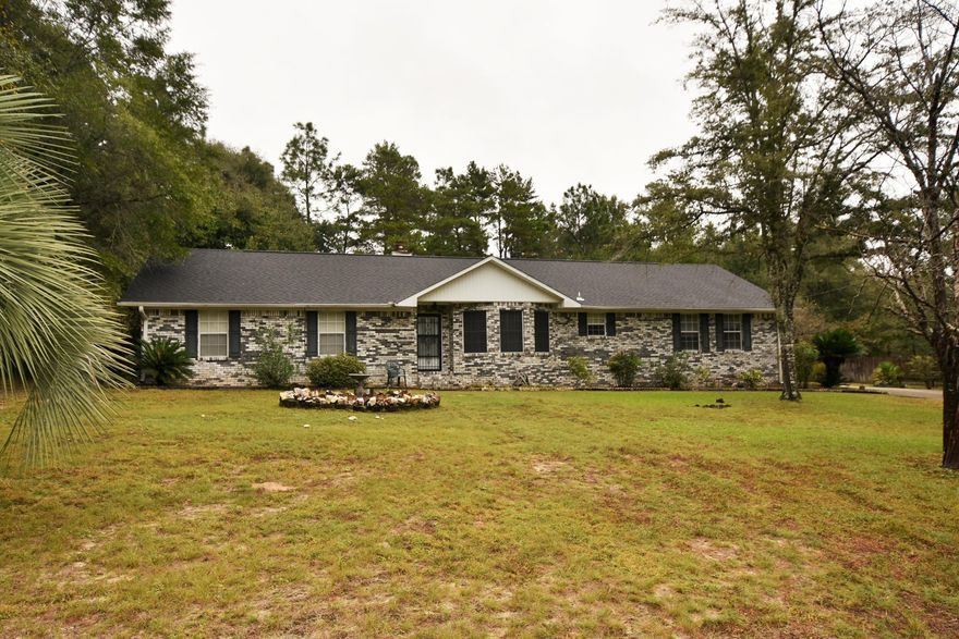 Great location for this home on an acre of land just outside the city limits saving you $ on property taxes! Seller PAYS $2,500 in CLOSING COSTS saving you $$$ on YOUR purchase of this home. New dimensional shingles installed in November 2018 saves you $$$ on your homeowner insurance! Plus...the home has all the extras: Brick Fireplace, built-in Shelving, Walk-in Pantry, Breakfast Bar, Bay windowed Dining, all Appliances, and a Florida Room. The owner was a hairstylist and had her own private Beauty Shop! Spacious oversized side entry garage with an extra utility door. The back yard is partially privacy fenced and has a greenhouse and work shed. See ''more'' for closing costs exclusions, repairs, information on the HVAC system and Jena-Air range. Take a look today!