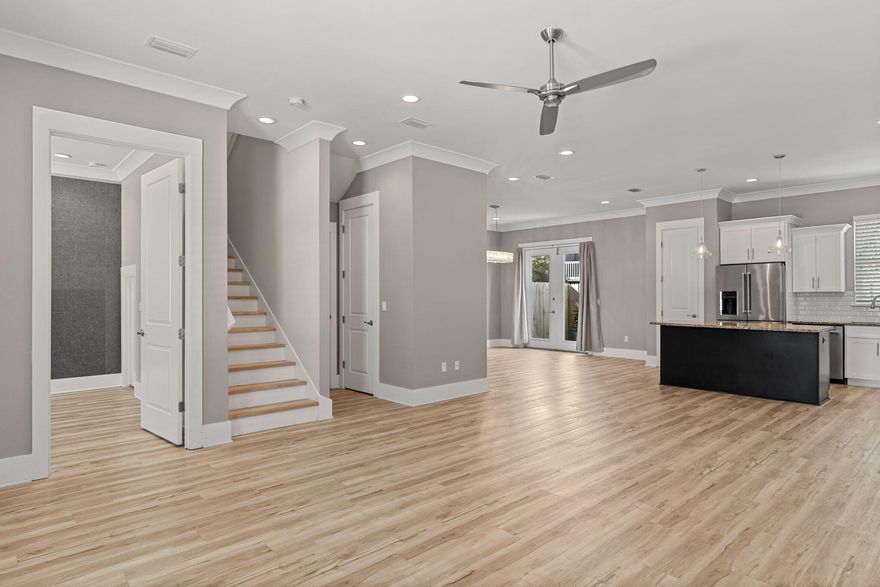 Modern comfort, fresh style, and exceptional convenience meet in the heart of Destin. Located within a gated community in one of Destin's most central and accessible areas, this beautifully updated 4-bedroom, 2.5-bath townhome offers outstanding versatility as a primary residence, second home, or turnkey rental investment. Originally built in 2017 and thoughtfully renovated in 2023, the home is bright, refreshed, and truly move-in ready. The interior has been freshly painted in preparation for listing, enhancing the home's clean, contemporary feel. Akadia Prescott flooring flows seamlessly throughout both levels, creating a warm and cohesive feel. The spacious primary suite showcases a fully redesigned walk-in shower with modern finishes and quality craftsmanship. The kitchen and living areas have been elevated with premium KitchenAid appliances, including a newer refrigerator and dishwasher, along with refreshed fixtures, upgraded lighting, and a new water heater. Additional value is found in the inclusion of a 77" LG OLED television and LG washer and dryer, allowing the home to feel immediately comfortable and functional from day one. With its modern finishes, functional four-bedroom layout, and low-maintenance design, Destin Oaks Unit 43 adapts effortlessly to a variety of lifestyles. Whether you're seeking a full-time residence, a coastal retreat, or a dependable rental opportunity in one of Destin's most desirable locations, this home offers an exceptional blend of style, location, and flexibility.