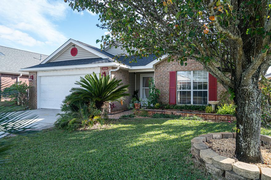 You can't get much closer to Hurlburt Field. This mostly brick home is right outside the East gate and convenient to Eglin AFB, as well. Great open floor plan with vaulted ceilings for a very spacious feeling. The bright and cheerful kitchen offers plentiful cabinets, a pantry, and an island for additional work space.  Split master suite plan for privacy features a walk-in closet, dual vanities and a garden tub.  Guest bath offers a pretty walk-in tile shower and pedestal sink.  The inside laudry room has cabinets, shelving and the washer and dryer are included. Tile flooring throughout for easy cleaning.  There is a large yard building for extra storage. The roof was installed in 2018, the hot water heater in 2015 and the HVAC in 2020. Buy this home today and be moved in by Christmas.