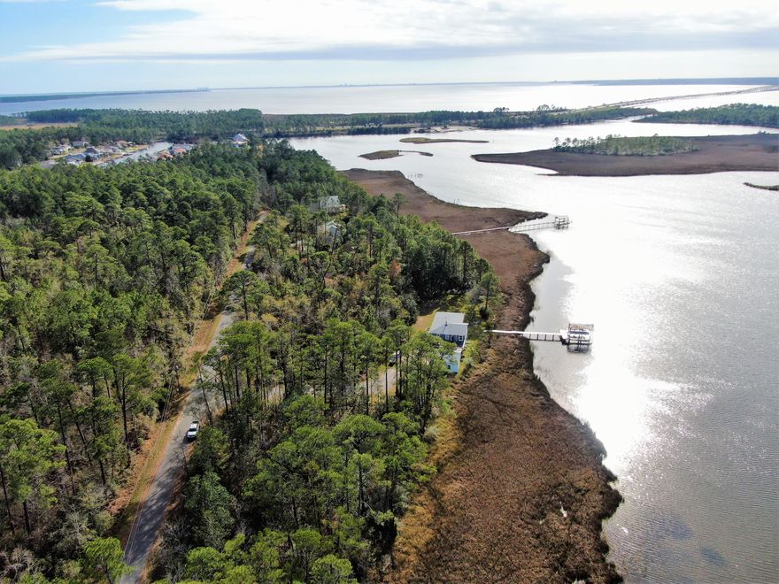 Another opportunity to own a water-front lot on Mulatto Bayou which lead into Escambia/Pensacola Bay .  Two parcels sold as one totaling over 1.12 acre. Located in Avalon, FL. Avalon is an unincorporated community and census-designated place in Santa Rosa County, Florida less than 30 minutes to Pensacola Beach and 20 minutes to Pensacola Airport or Downtown. The property is located a couple of minutes from exit 22 on I-10. It is on a paved road, all the utilities are available and ready to be tapped.  This is a fast paced growing area and the possibilities are endless. Enjoy great fishing, boating and beautiful sunsets.  Claim your perfect retirement destination or your vacation home spot today! Reach out for more information.