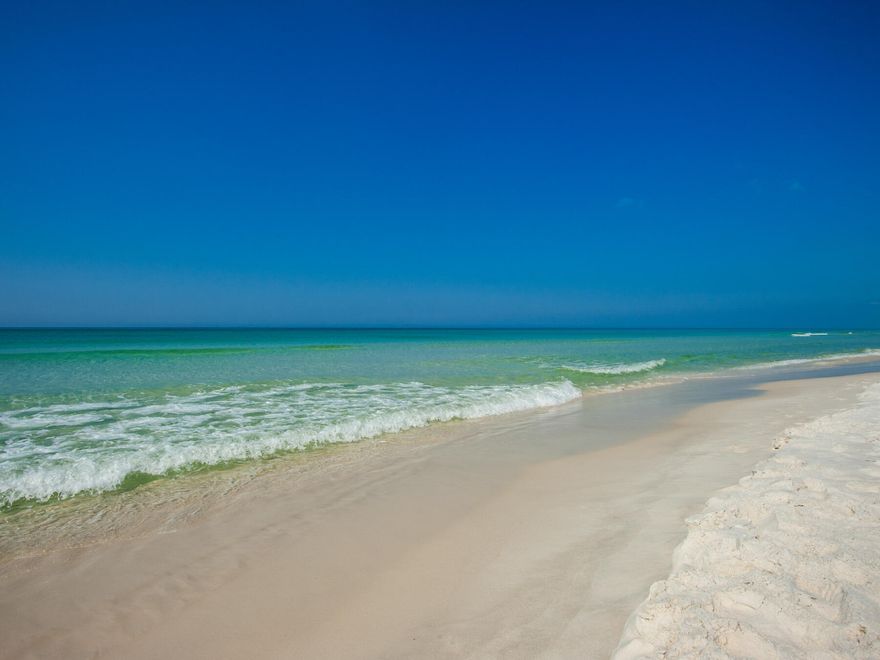 Welcome to this updated 2 bedroom, 2 bath within the gates of Tops'l Beach and Racquet Resort. This resort has long been a family favorite year after year. Offering 600 feet of private beach, pools, poolside dining, tennis, pickle and racquet ball courts and 24 hour security, Relax and enjoy the serenity with views of the Coffen Nature Preserve and the gulf. Updates include popcorn removal from all ceilings, HVAC replacement, kitchen backsplash, neutral paint, tile tub surround and some furnishings replaced.  This unit is currently being utilized as a second home with some vacation rentals and being sold fully furnished.