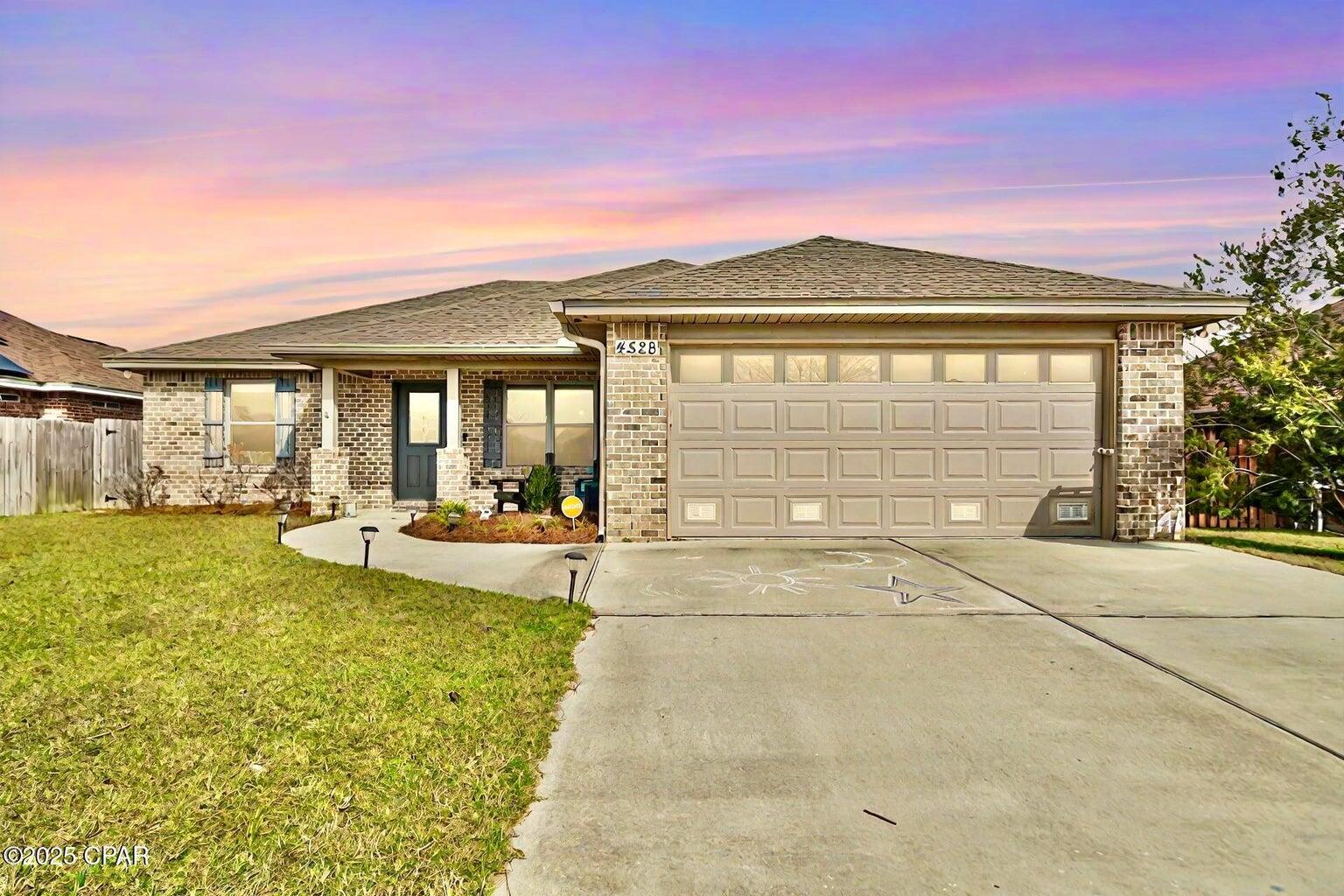 Welcome to 4528 Bylsma Circle, a beautifully maintained 3-bedroom, 2-bathroom home nestled in a peaceful and family-friendly neighborhood in Panama City. With over 1,800 of living space, this home offers the perfect blend of comfort and convenience. Upon entering, you're greeted by a spacious and open floor plan with abundant natural light. The cozy living room seamlessly flows into a modern kitchen featuring ample cabinet space, granite countertops, and updated appliances--perfect for preparing meals or entertaining guests. The master suite is a true retreat with a generous walk-in closet and an en-suite bathroom that offers double vanities and a modern tile shower. Two additional well-sized bedrooms share a full bathroom. Step outside to a large, private backyard, perfect for hosting gatherings, relaxing after a long day, or enjoying outdoor activities with family and friends. The home also includes a 2-car garage and a well-maintained driveway for plenty of parking. Located just minutes from local amenities, schools, shopping, and dining, 4528 Bylsma Circle is the perfect place to call home. Don't miss your chance to make this charming property your own!