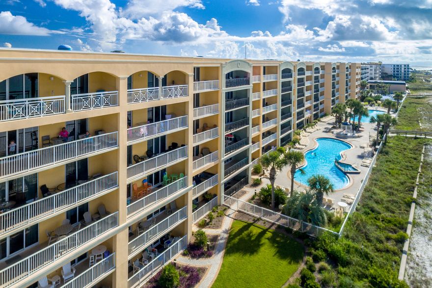 Gulf-front condo enjoying fantastic views and easy access to the gorgeous white sand and sparkling waters of the Gulf of Mexico! This unit has 3 bedrooms plus a bunk room, 3 baths, and an open living/dining room and kitchen. Highlights include crown molding, granite countertops, a large breakfast bar, stainless appliances, tile floors, dual sinks and jetted tub in the master bath, washer/dryer, and a large covered balcony for enjoying the gulf day or night. Fully furnished, this residence is turnkey, rental ready for those desiring an income-producing property!In addition to 516' of fabulous beach frontage, Azure offers beautiful pools/hot tubs, a fitness room and covered parking garage...