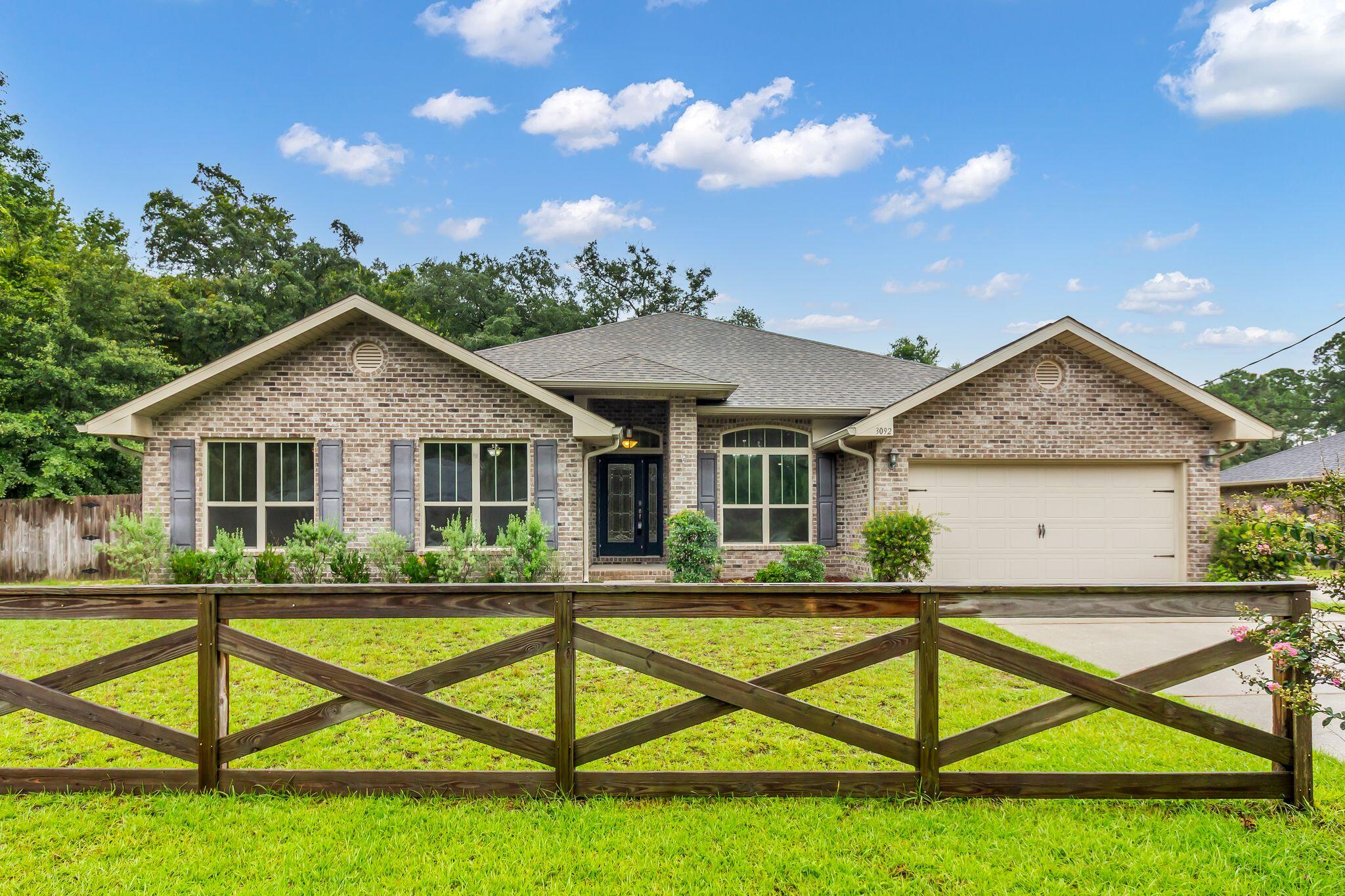 Welcome to this stunning 4-bedroom, 3-bathroom home located in the beautiful Navarre, FL. This property boasts a large lot with a fenced yard, providing ample space for outdoor activities and gatherings. The home is just minutes away from the beach, offering a perfect blend of suburban living and coastal charm. Inside, you'll find a spacious kitchen equipped with a kitchen island, providing plenty of room for meal preparation and entertaining. The home also features a cozy fireplace, adding a touch of warmth and elegance to the living area. The screened back porch is an ideal spot for relaxation, offering a comfortable outdoor space protected from the elements. Additionally, the property includes an extra driveway, providing ample parking space for guests. This home is a perfect blend of comfort, convenience, and coastal living.
Conveniently located and move-in ready, this house is a perfect place to call home. Don't miss your chance to see it! Schedule a showing today. Call 850-729-0399 View rental requirements or apply at www.RentwithBSR.com
No smoking or vaping. Pets allowed with some restrictions and a $400 non-refundable pet fee. FEES: $50 per adult 18+ application fee, Landlord Liability Policy (if proof of Renter's coverage is not provided) $15 mo, Pest Assurance pest control policy $20 mo.