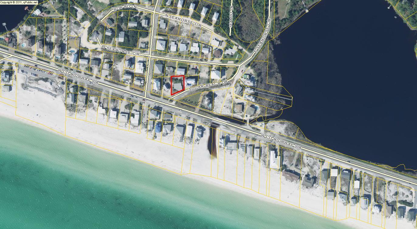 See the gulf from your front yard!!!!Great location just steps to the beach walkover. This bright and sunny Old Florida cinder block beach house is on 30A and sits on .255 acres. It is spacious with 3 bedroom 2 bath and has a large open living space that steps down to an even larger enclosed sunroom.