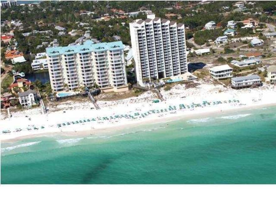 DIRECTLY ON THE GULF..STUNNING PANORAMIC VIEWS.. RARE FIND ..GREAT INVESTMENTUpdated and fully furnished!Rarely do these exquisite highly coveted, private, Grand Villas residence come on the market. This is truly quality at its finest! Grand Villas is rental restricted providing privacy and security with a separate security gate,parking and private amenities including a private gulf front pool and spa surrounded by expansive decks with an entertainment bar complete with ice maker and a beautiful walkway to the deeded beach. The Spectacular Gulf views across the entire back welcome you to this lovely 3 bedroom 3 bath condo. Freshly painted throughout in a soothing neutral palette. Beautiful drift wood-look plank tile floors throughout the entire kitchen,living area, hall and Master Suite.