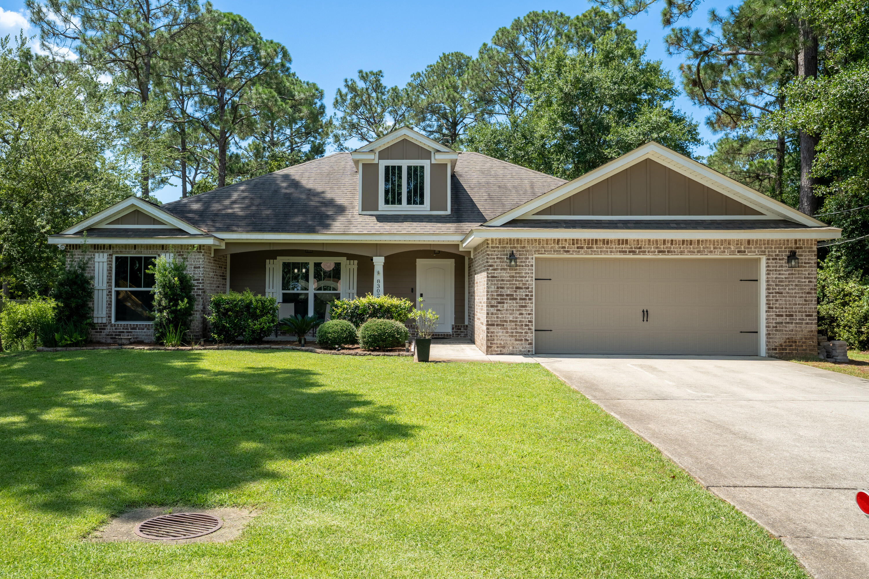 Enjoy coastal living just 5 miles from Navarre Beach in this 3-bedroom, 2-bath home on nearly half an acre! Built in 2018, this well-maintained home features an open floor plan with a split-bedroom layout, offering both comfort and privacy. The main living areas have durable tile flooring, while the bedrooms feature luxury vinyl plank--no carpet anywhere! The kitchen includes a center island, stainless steel appliances, and flows seamlessly into the living and dining areas, making it perfect for entertaining. The spacious primary suite is a true retreat with two walk-in closets and an en-suite bathroom featuring a garden tub, separate shower, and dual vanities. Outside, the oversized backyard offers endless potential for a pool, garden, or play space. With a 2-car garage and no HOA, this home is the perfect blend of freedom, functionality, and beachside convenience.