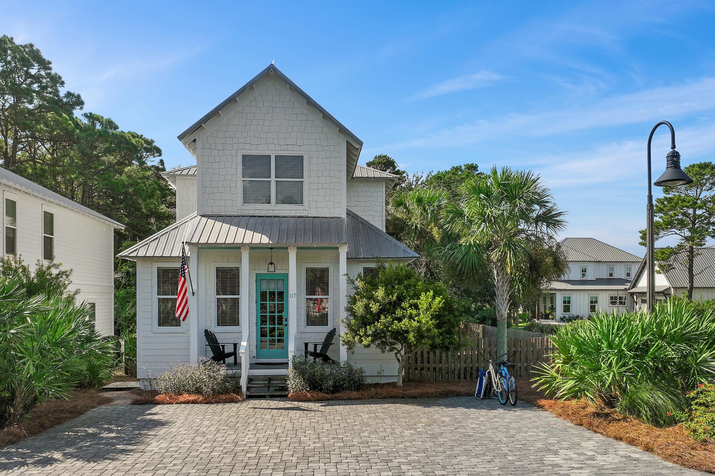 Best Value on 30A West! This 4BR/4BA beach home offers the ideal blend of location and comfort. Less than a half mile to 30A's beaches and the bustling Gulf Place Town Center with shops and restaurants. Home has a proven track record as a short term rental. Enjoy one of lowest HOA fees on 30A, a corner lot with fenced yard, and easy access to community pool. The home boasts an open floor plan with 10' ceilings downstairs. The main level includes a king bedroom with an ensuite bath. Upstairs, the primary suite features a king bed, walk-in closet, and luxe bath with double vanities, soaking tub, and walk-in shower. Another king bedroom has a private ensuite, while the fourth bedroom suits bunk beds or flexible use. Updates include a freshly painted exterior, new HVAC units, new bedroom carpet, and a fenced yard. 
