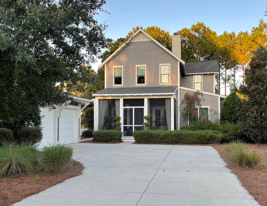 Custom built home located on a large corner lot at the southeast corner of Wind Garden Park. This 4 bedroom and 4.5 bath home has 11 ft ceilings on the first floor and wood floors throughout. This home has plenty of kitchen cabinet storage with a butler's pantry. There is a large master suite on the first floor with a custom walk-in closet. The first floor has a see-through fireplace between the great room and dining room and screened-in porches in the front and back of the home. The second floor has another master bedroom and two guest bedrooms which have views of the park. This home has a generator, added landscaping, and an expanded driveway.