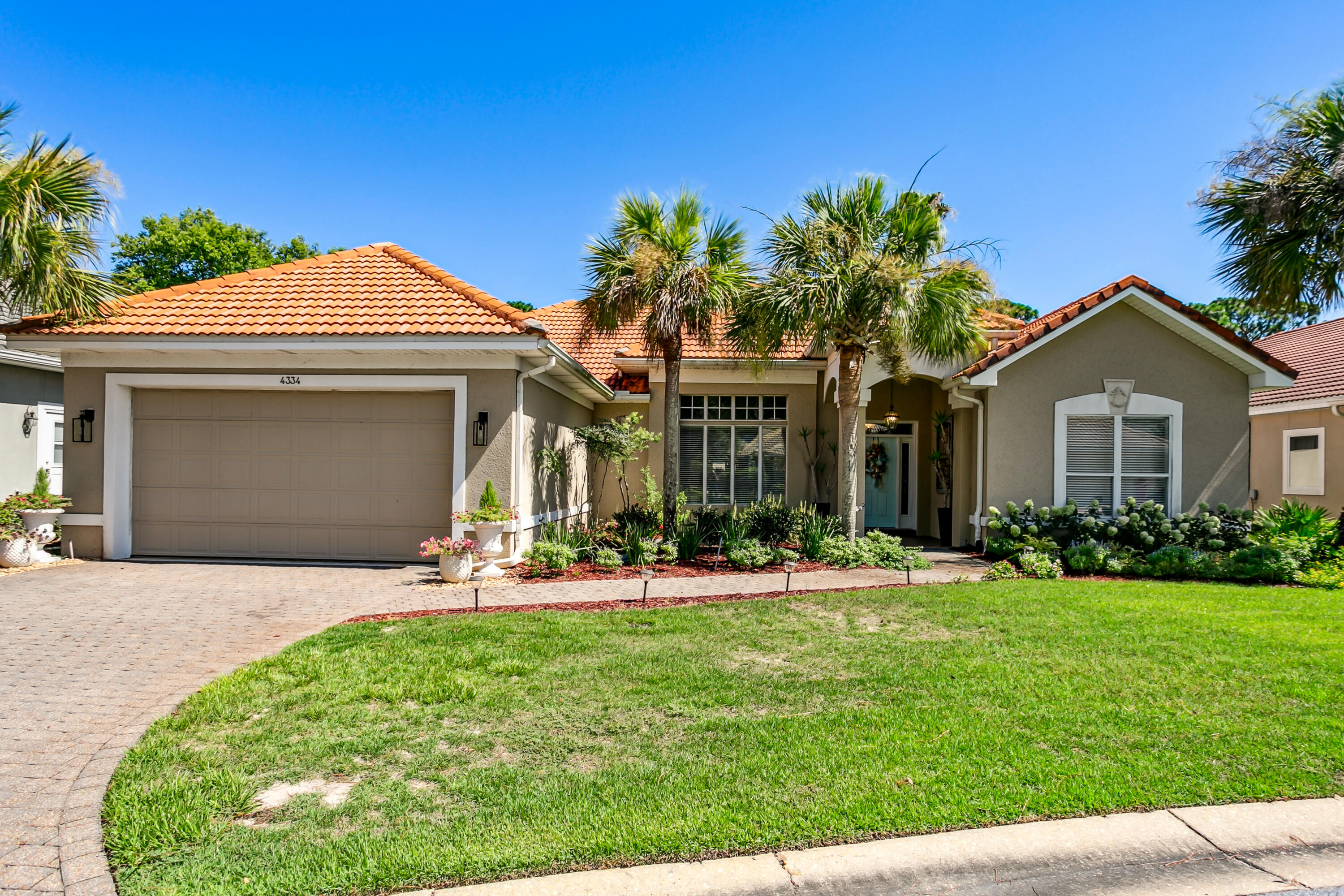 BACK ON THE MARKET!!NO FAULT OF SELLER. Here is your chance. This updated, custom built home is in the highly sought after private gated community of Sunset Beach. When you enter this home you are taken aback by the beautiful views of both the lake and marsh golf course. Features of this home are two living spaces, gas fireplace, separate dining room, gorgeous kitchen with custom built cabinets, stainless steel appliances, granite counter tops, and island, a breakfast bar and nook. The open floor plan makes this home perfect for entertaining. HVAC and Water Heater are 2022. Sunset Beach amenities include lawn care, private beach, community pool, clubhouse and one round of golf monthly at the Bluewater Bay Golf Club. Live every day as if you're on vacatio