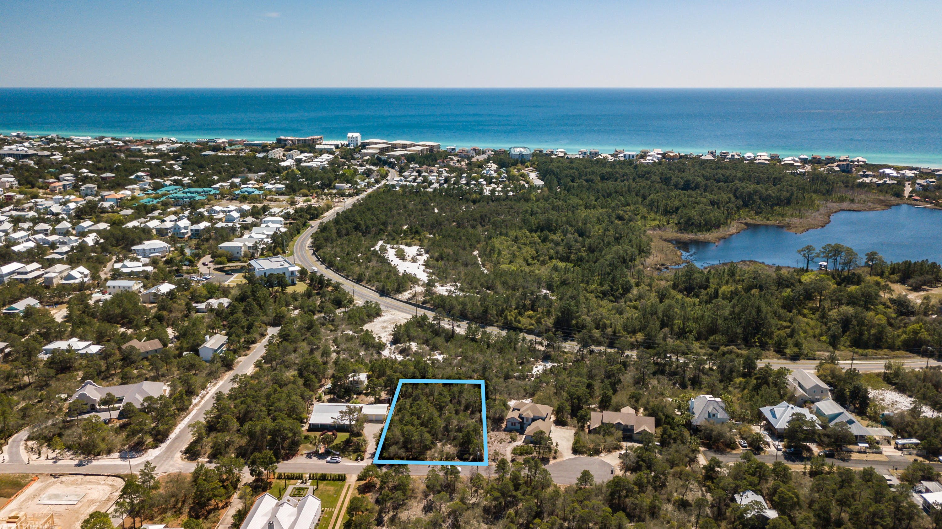 Lot 4 West Blue Coral Drive is a fabulous opportunity to build your dream home on a large 1/2 acre lot in the quiet Pines of Blue Mountain with tons of privacy! 30A offers easy access to the Timpoochee Trail with bike and walking paths and easy beach access! Close to Grayton Beach, Seaside or Gulf Place with wonderful shopping, dining and entertainment options. The aerial photos show just how close this is to the water and how much room is available to Build your next home on this 1/2 acre lot. Buyer to verify all information including but not limited to lot size, zoning etc.