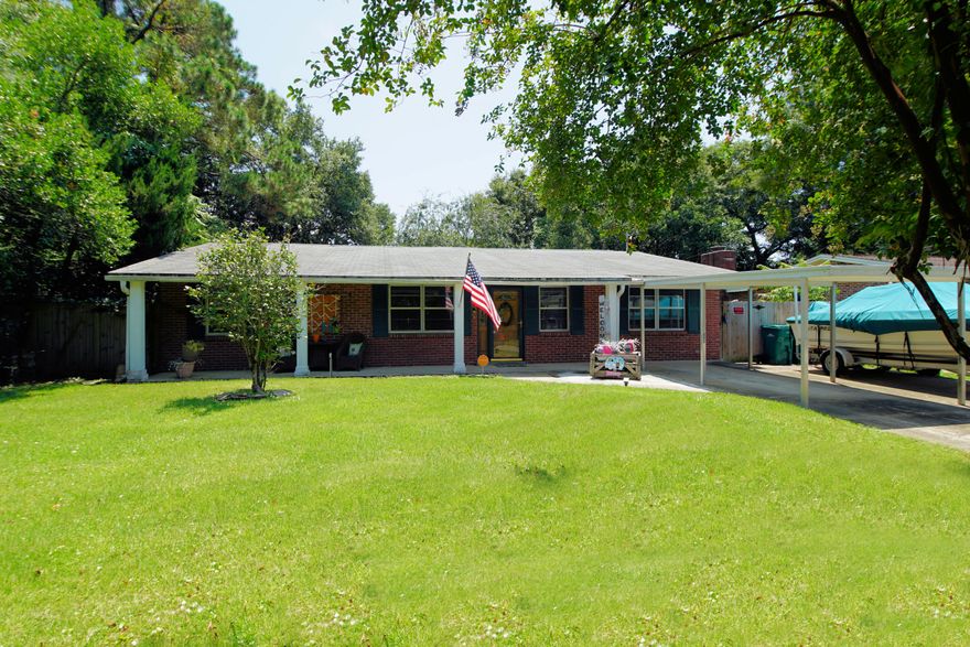 Space! Space! And More Space! Oversized Parking Along With a Covered Parking Area. This Home is Ready for You. From the Welcoming Front Porch to the Florida Room! All Brick with 3 Full Bedrooms And an Office. Large Living Area Provides Loads of Space for Everybody. The Kitchen is Updated with Granite and Stainless and Room for More Than One Chef. Pantry Doors are Painted with Blackboard Paint - Write Your Menu! Dining Room will Accommodate a Large Table for Gatherings! Large Master Suite with Private Bathroom. Climate Controlled Storage Area with a Window AC Unit so Christmas Decor Won't Melt!! Screened-In Patio. Uncovered Patio for Grilling. Park Like Backyard is Gorgeous. Make This YOUR Home! Buyer to verify measurements.