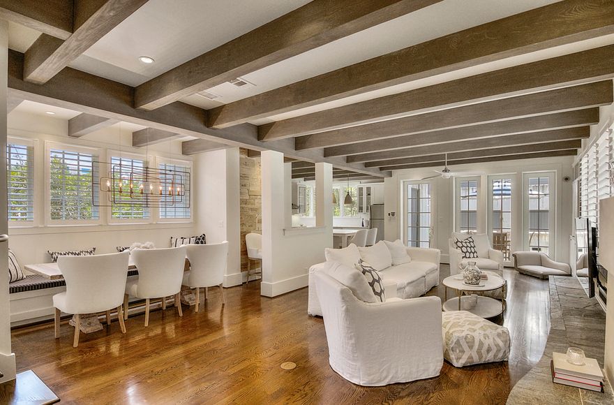 ONE BLOCK FROM THE BEACH! NEWLY UPDATED! This beautiful custom designed home is constructed of solid concrete block. Located on a corner, just one block from the gulf and beach walkover offering easy access to the beach. The open kitchen-living area has been updated to include MARBLE countertops, refinished floors, fresh paint throughout. A newly added HEATED, SALTWATER POOL is located on the private side porch surrounded by Trex decking. The wood floors have been extended to the second floor which hosts the master suite and two guest bedrooms. Offered fully furnished with new furnishings throughout. The sellers have added foam insulation both underneath the house and in the attic, a new Rinnai water heater, aluminum gating and a new irrigation system.