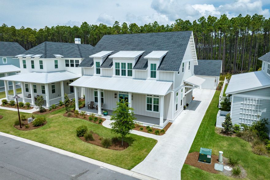 Retreat to this stunning, expanded Rose Cottage in the coveted Greenway enclave, backing up to pine forest and across from a pond. Shiplap adorned walls envelop this Open Salon concept with primary BR on main floor. Modern gas fireplace acts as focal point as you enter home, while the Dolomite Island/breakfast bar anchors the kitchen area with stainless steel, gas range/double oven, microwave drawer, side by side refrigerator and Sub Zero Dual Zoned wine fridge. Wide plank, blonde wood floors, stairs, upgraded lighting and plumbing throughout. Upstairs light & bright loft serves as media/play area with 4 BR and 3 BA. Outdoor living enjoyed poolside, spa & cabana with gas fireplace for those chilly eves. The Watersound Origins community is one of South Walton's most coveted neighborhoods for its exceptional amenities, beautiful new homes, and prime location. Amenities include the Village Commons pool & fitness center, sports courts including tennis and pickleball, miles of nature trails, unlimited golf and lots of green space for outdoor play. The all new Watersound Town Center brings a new level of excitement and convenience to the community with a Publix Super Market, delicious restaurants, healthcare facilities, a seasonal weekly Farmers Market, and more right at the entrance to the neighborhood!