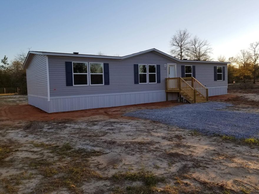 This home qualifies for the USDA 0 down loan.This a brand new manufactured home sitting on a 1/2 acre lot. Where can you find a brand new home on 1/2 acre lot for under $100,000? This home has an open spacious floor plan, walk in closets, and a separate utility room. Plenty of cabinets and a kitchen island. The property has a nice country setting. Close to Ft. Walton and Destin this is perfect for a family moving into the area. Several lenders offering easy online applications for financing. The home is approved for FHA and VA financing. Square footage and room dimensions to be verified. Photos with furniture are from a like model from another home.