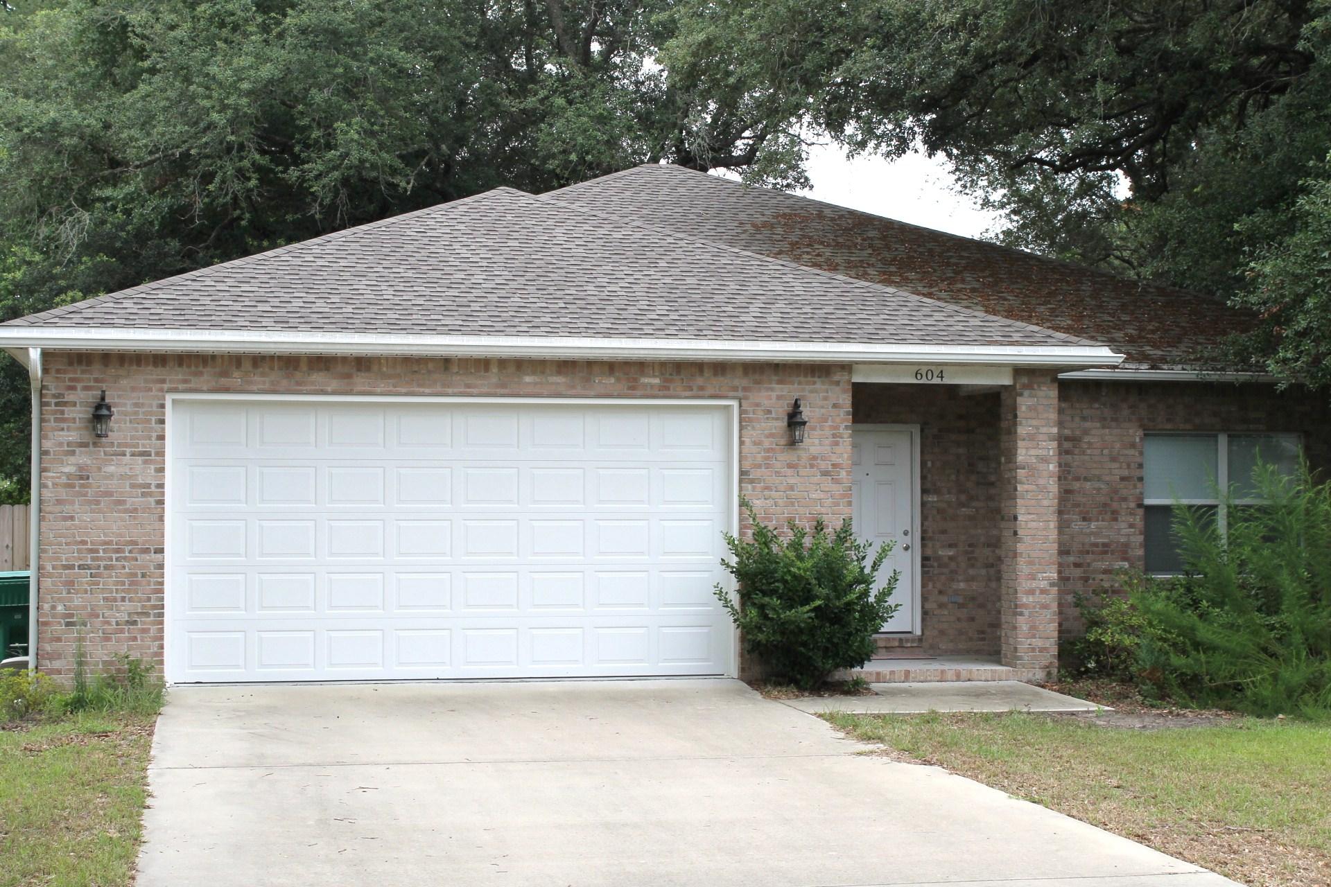 MUST SEE located in the heart of Niceville. Home is in immaculate condition and complimented with 9ft ceilings, oversized impact resistant windows, upgraded windows and doors and a reinforced garage (Note: The impact resistant windows and garage door drastically reduced insurance costs!) The 17 x 18 living room flows into the kitchen with breakfast bar and dining area. There is an additional area off the living area that is currently being used as an office. Plenty of cabinets, solid surface countertops and bar area with a nice sized pantry. The master bedroom suite features a 14 x 14 bedroom, a HUGE walk-in closet, and double vanities. The home is on an nice sized lot with privacy fence and patio off the back of the home. New sod has just been installed in the front yard.