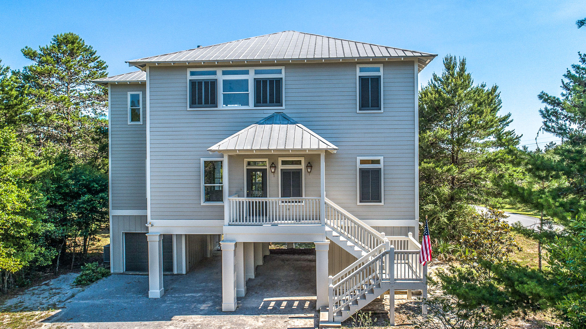 Do you desire the 30A lifestyle? This 4 bed / 3 bath home has it all! 3 deluxe size sitting decks, TRUE Gulf views, all stainless steel appliances,hardwood floors, 2 New HVAC systems, raised ceilings, a gorgeous backsplash,3 large decks, a garage and plenty of room to entertain! Back yard has plenty of room for a pool. This quiet neighborhood is perfect for family vacation rentals or for a primary residence. This home boasts an oversized lot and a serene atmosphere neighboring Topsail State Park. There are two master suites, an additional bedroom, and an office/bedroom. This house has a projected rental income of $55,000. Located just 1 block from Butler Elementary, walk to the beach or shopping! Don't let this house pass you by! Stop waiting and call your Realtor!