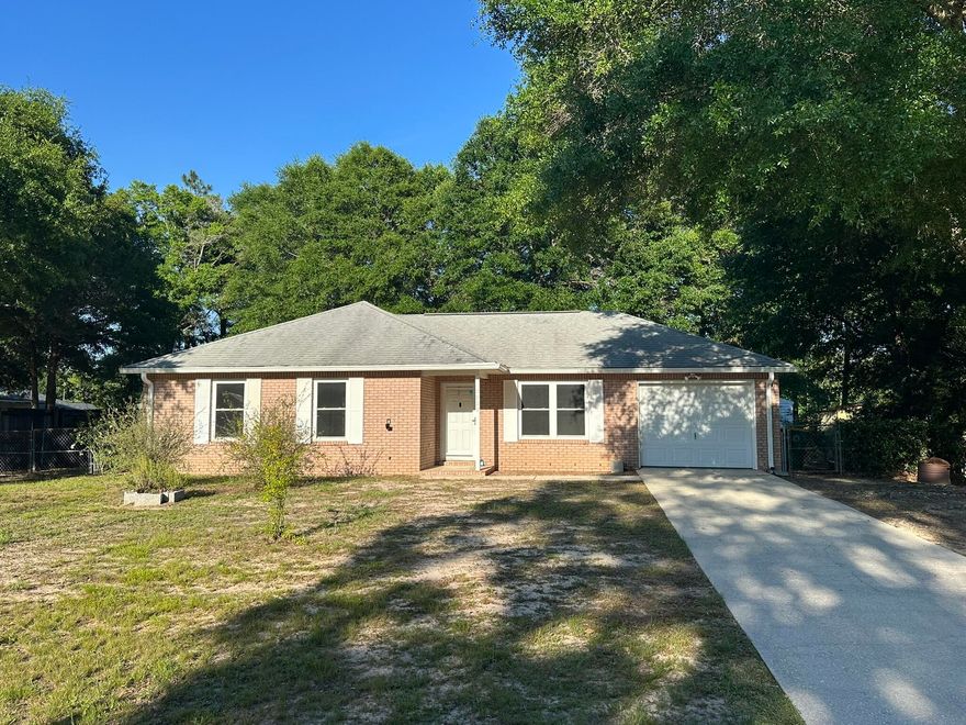 Come home to this all-brick level fenced yard. 3 bedroom ,2 bath with New windows, paint and a recent new roof. Check out the back yard with a Florida room, greenhouse and a huge she- shed with insulation and a n a/c! Discover the ideal blend of community charm and daily convenience in high-demand North Crestview. Known as Northwest Florida's Hub City, this location sits at one of the highest elevations in the state, offering a peaceful residential atmosphere with an easy commute to major regional employment hubs, Duke Field, and Eglin AFB. Outdoor enthusiasts will appreciate proximity to the Shoal and Yellow Rivers for kayaking and fishing, alongside nearby Blackwater River State Forest. Enjoy a vibrant local lifestyle with historic downtown shopping on Main Street, community festivals, local golf courses, and diverse dining options, all just a short drive from the Emerald Coast's white-sand beaches.