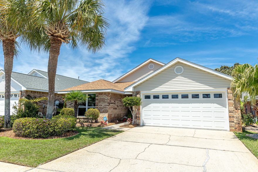 Welcome to Sunsail, a charming, golf cart-friendly community with a community pool and positioned less than five minutes from The Destin Commons, Publix, and Regatta Bay Golf Course. You're only a few blocks from multiple beach access points including the new $16M Tarpon Beach Park, making this home a perfect vacation rental or a primary residence. This single-story, all-brick home with a fenced back yard offers major updates including a new roof and fascia (2021), R-40 attic insulation (2022), and hurricane-impact windows, doors, and an updated garage system. The HVAC ductwork was professionally sealed with Aeroseal in 2022 for improved efficiency. The kitchen features stainless steel appliances, including a gas range with overhead vent. Enjoy 2 living areas, one with a cozy fireplace! The home has been meticulously maintained with regular AC servicing, dryer vent cleaning, termite protection through Centracon, as well as ongoing pest control and lawn care.