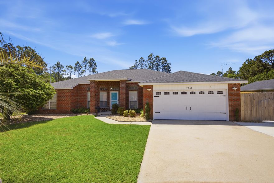 Welcome to 7367 Brevard St, nestled in the desirable Hidden Creek Estates. This well-maintained home offers a blend of thoughtful upgrades and functional improvements, perfectly suited for comfortable Florida living.  As part of the Holley by the Sea community in Navarre, residents enjoy access to an impressive array of amenities including pools, a sauna, fitness center, fishing pier, and community center, just to name a few. Major system upgrades include a new roof (2020), AC unit (2024), whole-house surge protector (2025), and storm shutters installed throughout. The home also includes a transferable termite bond through July 2026 and has been professionally maintained. Inside, you'll find ceramic tile flooring throughout most of the home (installed in 2020), complemented by ceiling fans in all bedrooms and the office. The living area is enhanced with concealed wiring for a mounted tv for a clean, modern look. The kitchen has been refreshed with painted cabinetry (2021) and is supported by practical upgrades including a gas hot water heater and added gas lines for both the stove and dryer. The primary suite has been tastefully updated, featuring a custom subway tile shower, recoated tub and vanity, and a resurfaced countertop (2021), creating a fresh and inviting retreat. Additional interior improvements include all toilets being replaced in 2020 and a whole-house air purifier system for enhanced indoor air quality. Step outside to enjoy a private backyard oasis complete with a pool featuring solar heating (2018) and a newly replaced screened enclosure roof (2025). The property also offers excellent functionality with a newly added RV pad (2025), complete with three dedicated electrical outlets, as well as additional parking space in front of the fence. With quality upgrades, practical features, and exceptional community amenities, this move-in ready home presents an outstanding opportunity in Navarre.