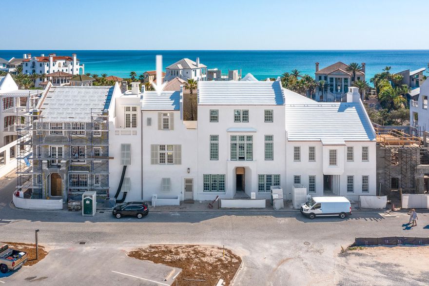 Welcome to 117 Elbow Beach Road, a breathtaking masterpiece currently under construction in Alys Beach, designed by the esteemed Architect Gary Justiss. Scheduled for completion in May 2026, this luxurious residence seamlessly blends modern elegance with coastal charm, offering an unparalleled living experience.  Gary Justiss personifies the elegance of the Bermudan architecture Alys Beach procured.  
Spanning an impressive 4,378 square feet over two and a half stories, this home boasts stunning water views of the Gulf of Mexico. With five elegantly appointed bedrooms, each featuring en suite bathrooms, and three powder rooms strategically located on every level, this residence ensures comfort and privacy for family and guests alike. Venetian Plaster walls travel with you throughout the home.

The first floor welcomes you with three exquisite guest suites that open directly to a private courtyard, complete with a shimmering swimming pool, sun terrace, and exterior powder room with shower--perfect for effortless outdoor entertaining. Ascend to the second floor, where the layout is nothing short of extraordinary. Here, you'll find a generous primary suite that exudes luxury, featuring a lavish dual vanity bathroom adorned with beautiful marble tile and a spacious shower, complemented by two expansive closets.

The main living area is an entertainer's dream, showcasing a gourmet kitchen, dining room, and living room, all anchored by a cozy fireplace and a fully equipped wet bar plus Butler's pantry. Large-scale windows and sliding doors bathe the space in natural light, creating an inviting atmosphere. This level also features one of three captivating terraces, seamlessly integrating indoor and outdoor living with a dining area under the stars and a summer kitchen, perfect for al fresco dining.  

The third floor is a true highlight with elevator access, offering two stunning rooftop terraces, the fifth guest bedroom, and a spacious living room that opens to a vast rooftop terrace. Here, you'll be captivated by panoramic water views and the iconic rooftop architecture that Alys Beach is renowned for. A full bar island, complete with a beverage center and ice maker, ensures that your outdoor gatherings are as luxurious as they are enjoyable.

This property is truly unparalleled, presenting an exceptional opportunity for full-time living or a lavish vacation retreat. Experience the pinnacle of luxury coastal living at 117 Elbow Beach Rd.--your dream home awaits.