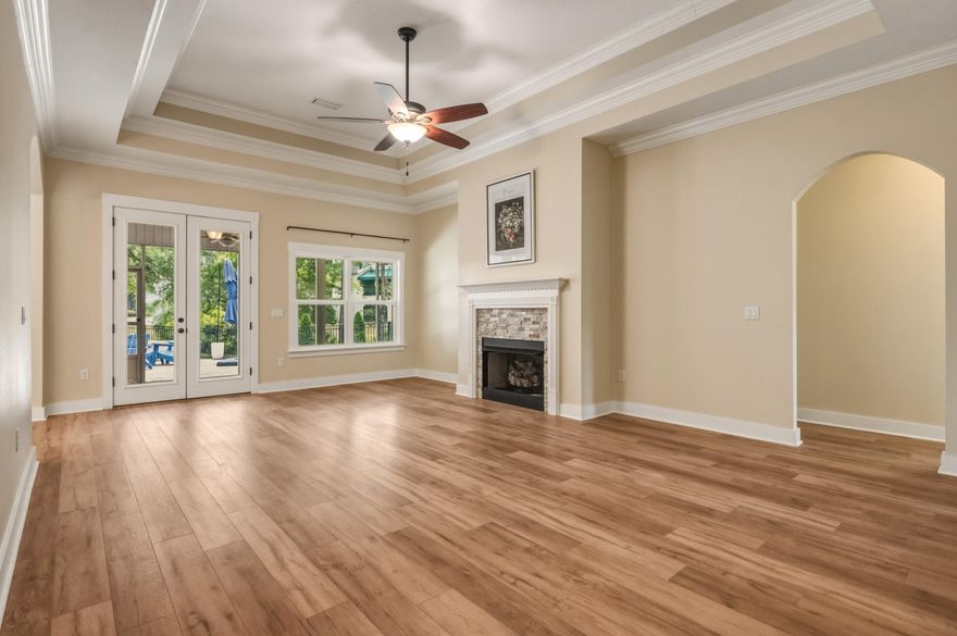 Experience the Bluewater Bay lifestyle in this beautifully updated Niceville home featuring brand new flooring throughout, peaceful water views from both the front and back, and an outdoor space designed for relaxing and entertaining. Located in one of Niceville, Florida's most desirable communities, this newer home offers the perfect blend of comfort, convenience, and scenic surroundings.

Built less than 10 years ago, the home provides the advantages of newer construction with an open concept layout, abundant natural light, and a welcoming design ideal for both everyday living and hosting guests. Large windows frame the water views and bring the outdoors in, creating a calm and inviting atmosphere throughout the home. A freshly painted front door adds charm and curb appeal, making a warm first impression.

Step outside to enjoy the backyard paver patio with a built in firepit, perfect for quiet evenings under the stars, morning coffee, or gathering with friends and family. Combined with the serene water views, this outdoor living space adds to the home's unique appeal and lifestyle.

Living in Bluewater Bay means enjoying a lifestyle centered around recreation, convenience, and connection. Residents love the nearby golf courses, parks, walking paths, marina access, dining, and easy access to the white sand beaches of the Emerald Coast. This location is also highly desirable for those seeking proximity to Eglin Air Force Base, Hurlburt Field, and the 7th Special Forces Group, making commuting simple while still enjoying the beauty and tranquility of Niceville.

If you are searching for a newer home in Niceville with water views, modern comfort, outdoor living, and access to the Bluewater Bay lifestyle, this property offers a rare opportunity to enjoy it all.
