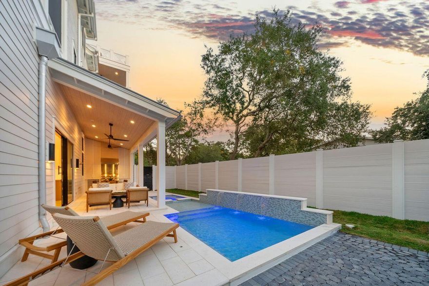 Where Coastal Luxury Meets Elevated Design:
This exceptional retreat in Old Seagrove seamlessly blends architectural sophistication with timeless coastal style. The 5,283 sq. ft. residence is offered fully furnished and showcases five bedrooms, including three primary suites, two guest suites, a bunk room, media room, and 6.5 baths.
Step through the grand entryway into a light-filled foyer with soaring 12-foot ceilings, setting the tone for the remarkable design within. The gourmet kitchen impresses with Wolf and Sub-Zero appliances, a stone slab backsplash carried all the way to the ceiling, and a generous island perfect for entertaining. The kitchen flows seamlessly to a sitting area and open living room, continuing into a grand dining space just steps from your private wine room. Completing the first floor is one of two primary suites, adorned with custom cypress ceilings and a spa-like bath.
The second floor welcomes you with a spacious landing that leads to a second primary suite with tranquil, spa-inspired finishes and separate soaking tub, an additional guest suite, a media room, bunk room, and an oversized screened porch tucked beneath the oaks  the perfect retreat for coastal evenings.
On the third floor, a secondary living space awaits  complete with a built-in beverage center for effortless entertaining  connecting to a third primary suite option, an additional bedroom, and an expansive outdoor terrace. As you ascend to the fourth floor, you're greeted by an abundance of natural light and a dramatic chandelier, leading to the rooftop deck  a show-stopping perch above the treetops, offering panoramic Gulf views and sweeping coastal vistas.
Designed for indoor-outdoor living, the home features over 1,000 sq. ft. of porches, a private pool and spa, elevator, and wide-plank oak flooring throughout. Every finish and fixture reflects a commitment to quality and sophistication.
Perched on one of Old Seagrove's highest natural elevations  rising 40 feet above sea level  the property offers a rare vantage point with Gulf breezes, serene views, and convenient access to Seagrove's sugar-white sands. Residents enjoy plenty of room to unwind and take in the emerald waters of the Gulf.
In collaboration with NOLA 30A, Fox Construction, Stackable + Mracek, and Design and Dwell, this home represents a masterclass in coastal design, crafted for those who appreciate artistry, architecture, and effortless living.